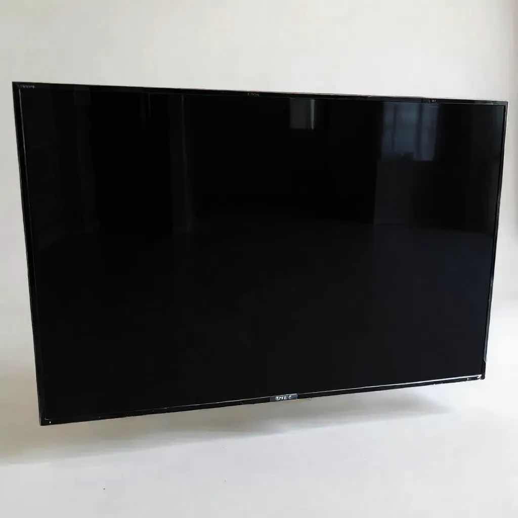 Photo 1 of SONY BRAVIA 49" TV ON STAND W REMOTE