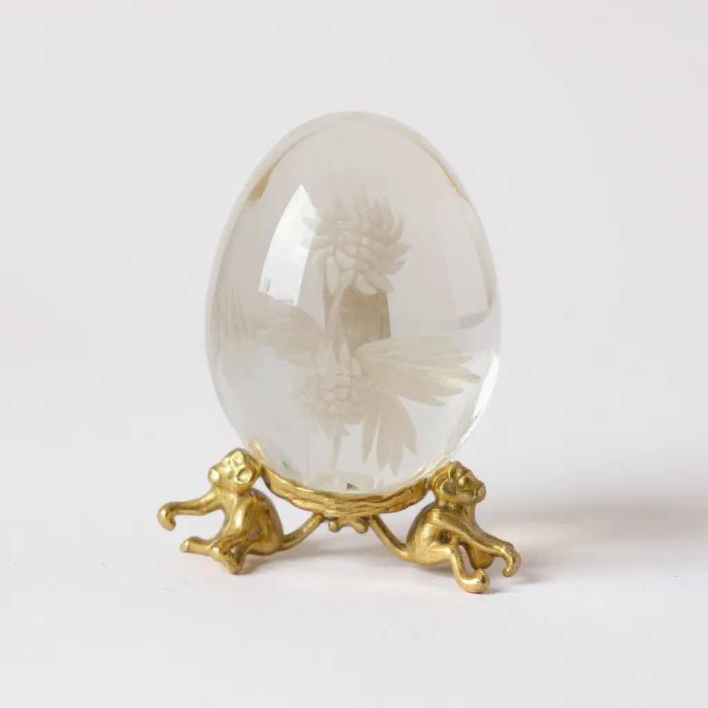 Photo 1 of LEAD CRYSTAL EGG W FLORAL DESIGN ON STANDS H 5"