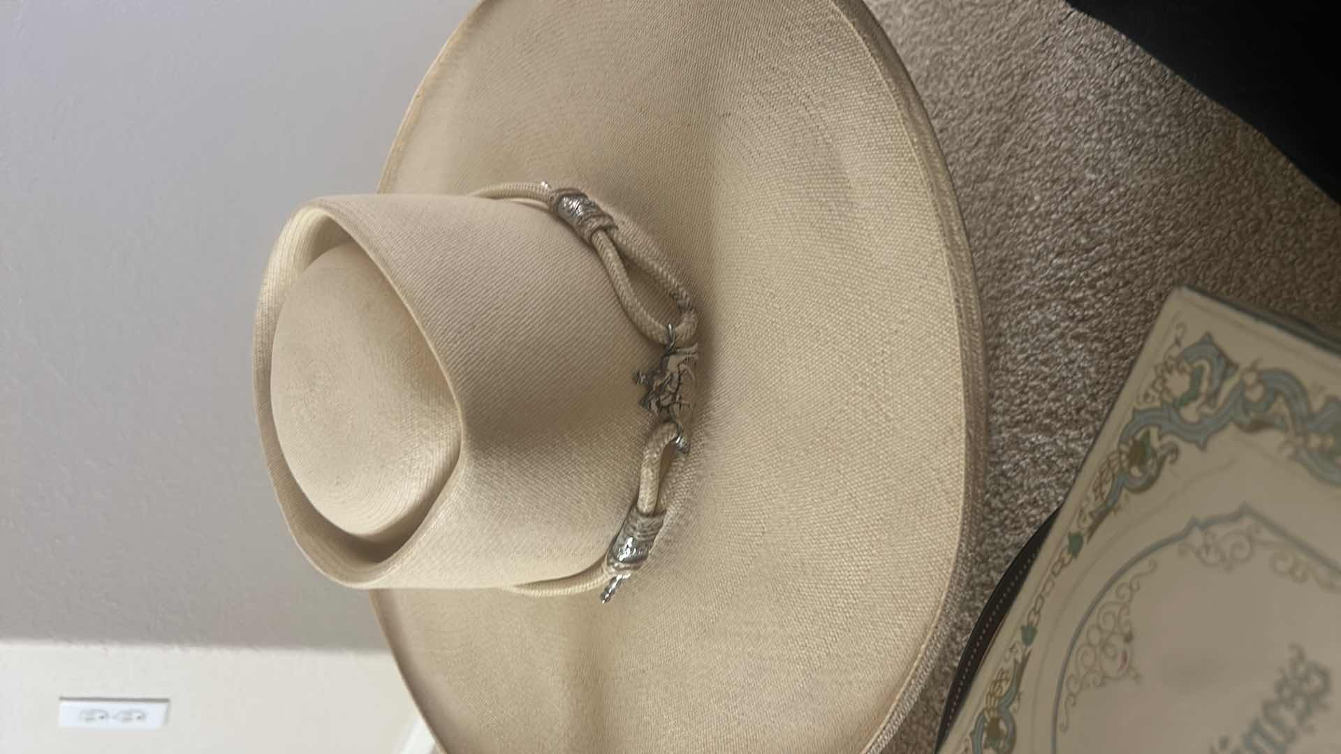 Photo 1 of WOMENS ASSORTMENT, COWGIRL HAT, BEAR PAW BOOTS SIZE 10, SCARVES, HANDBAGS AND MORE