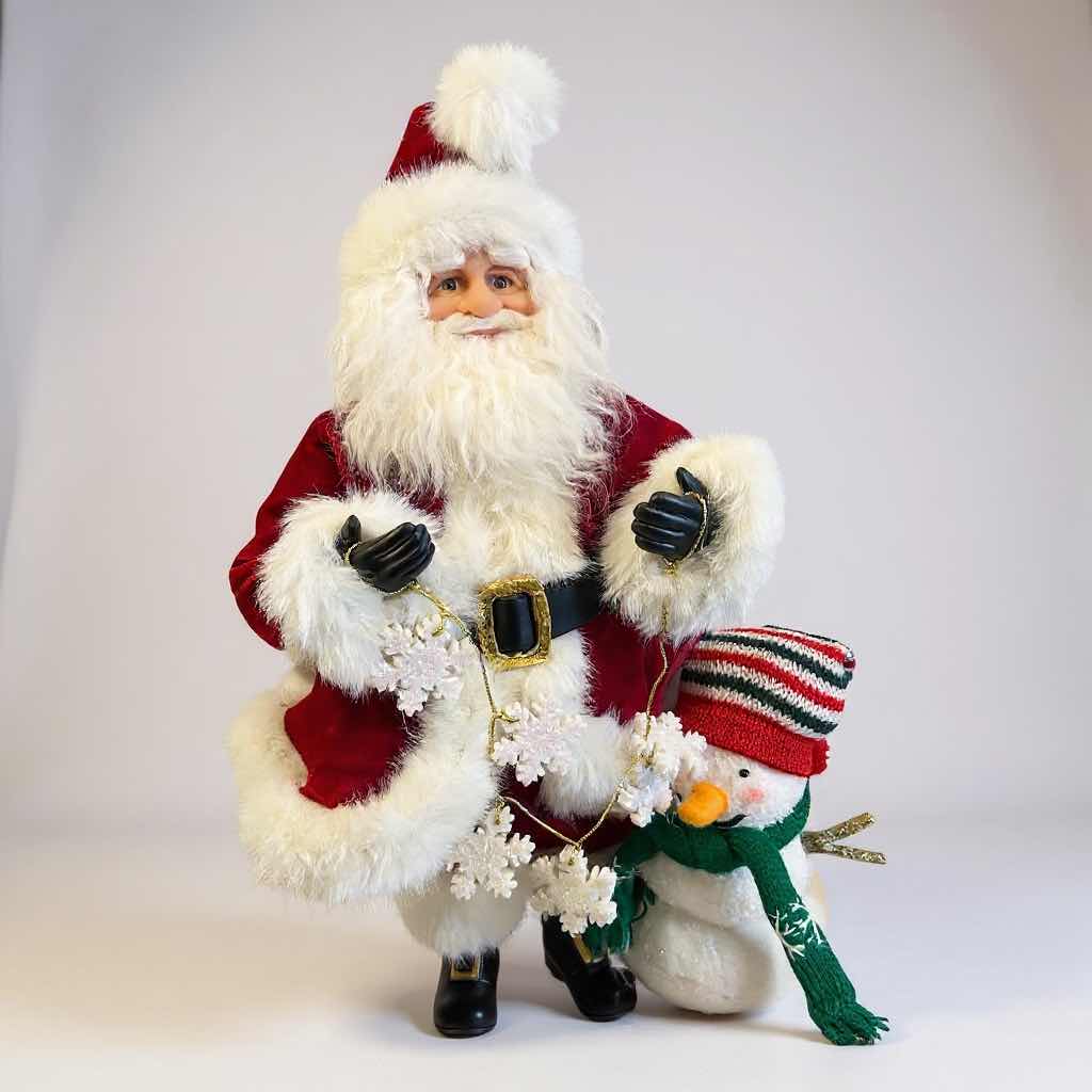 Photo 1 of COLLECTABLE SANTA FIGURINE W SNOWMAN HOLDING SNOWFLAKES H 18"