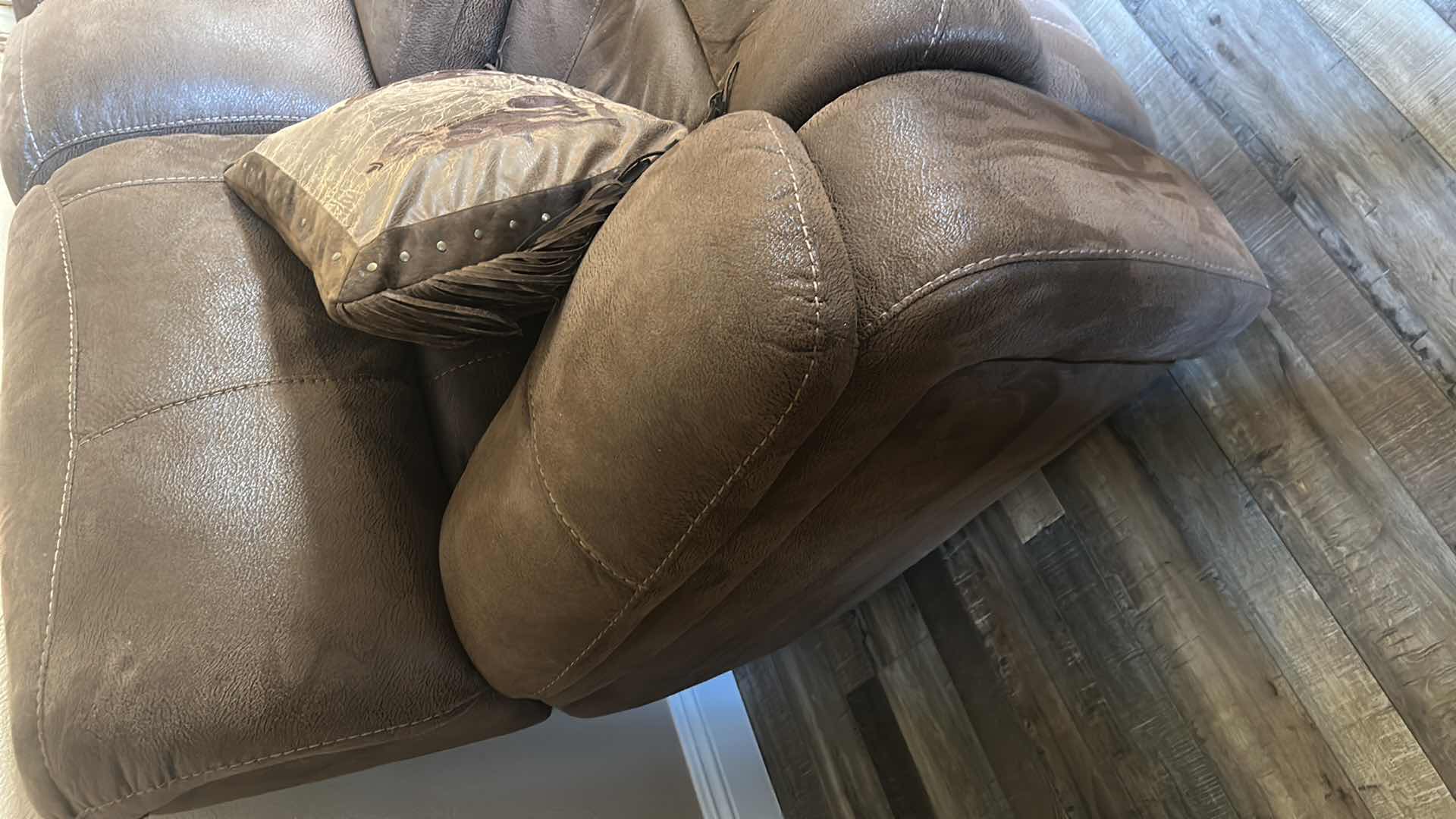 Photo 1 of BROWN SOFT SUEDE RECLINING LOVESEAT W CENTER CONSOLE & CUP HOLDERS 6.5FT