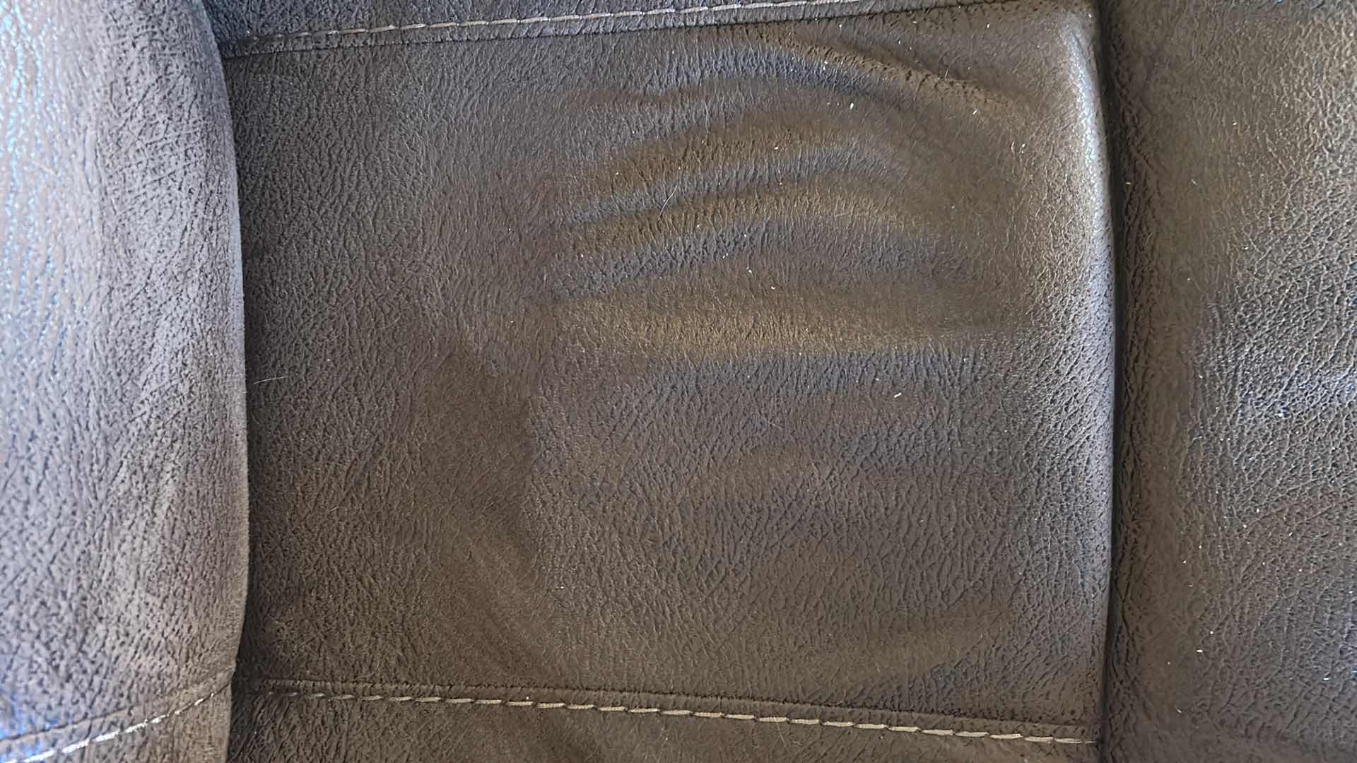 Photo 1 of BROWN SOFT SUEDE RECLINING LOVESEAT W CENTER CONSOLE & CUP HOLDERS 6.5FT