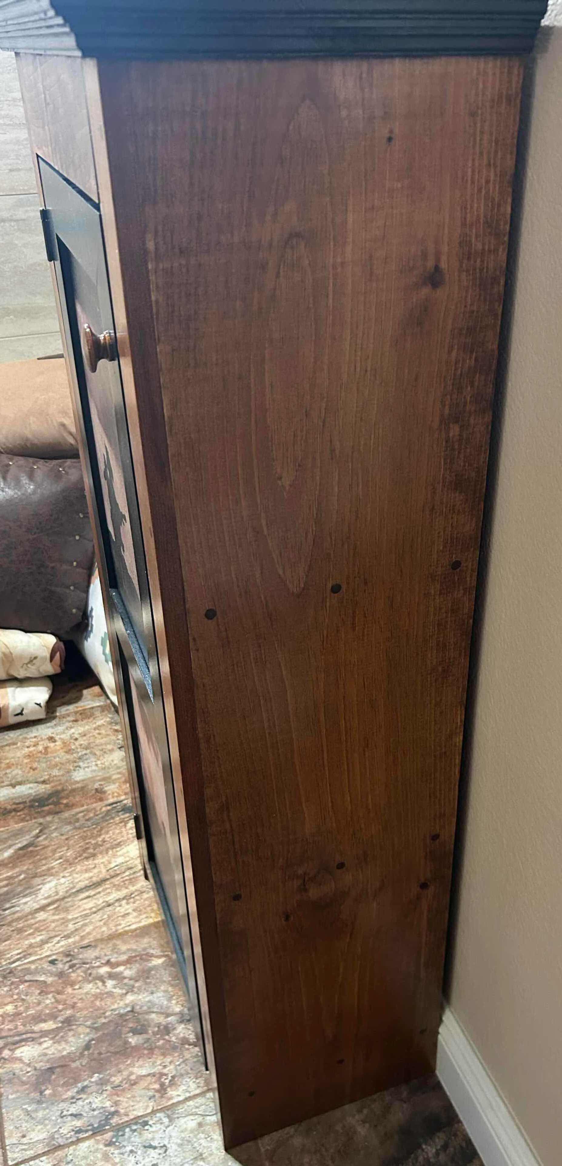 Photo 1 of KNOTTY PINE COWBOY DREAMS CABINET 23" X 14" H 48"