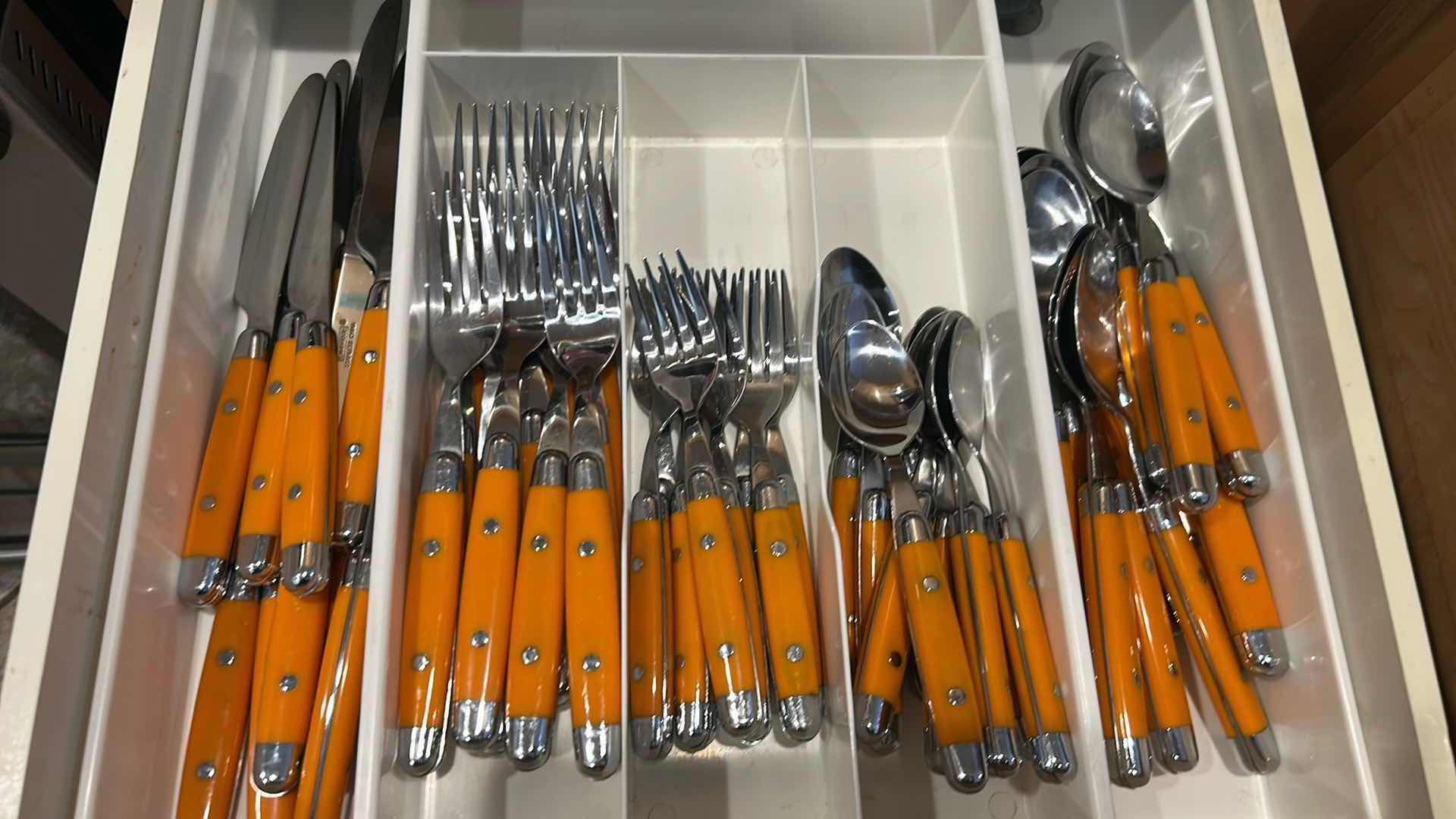 Photo 1 of CONTENTS OF DRAWER ORANGE HANDLE CAMBRIDGE FLATWARE