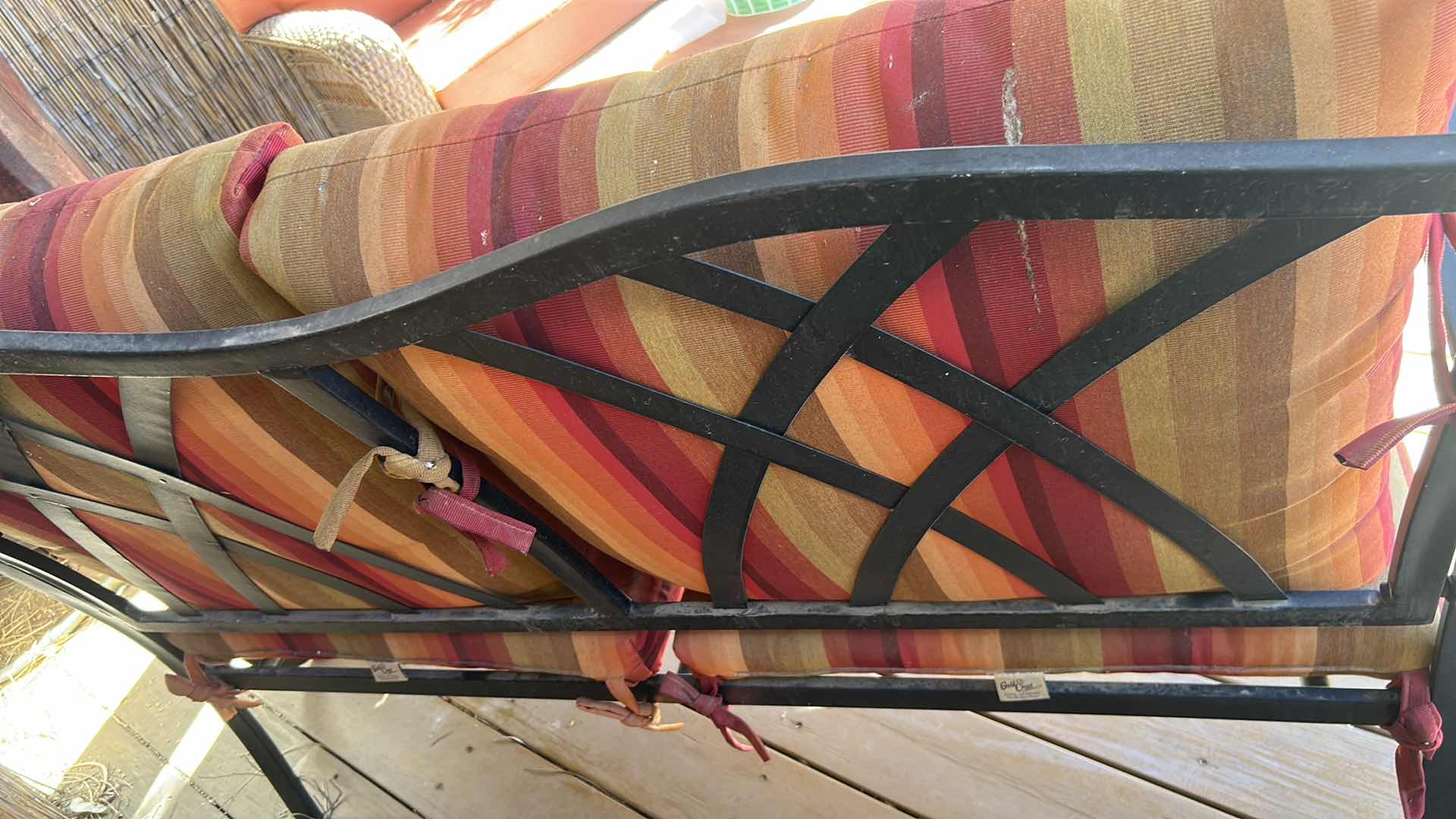 Photo 1 of COASTAL METAL FRAME LOVESEAT W ORANGE STRIPED CUSHIONS 48" X 25