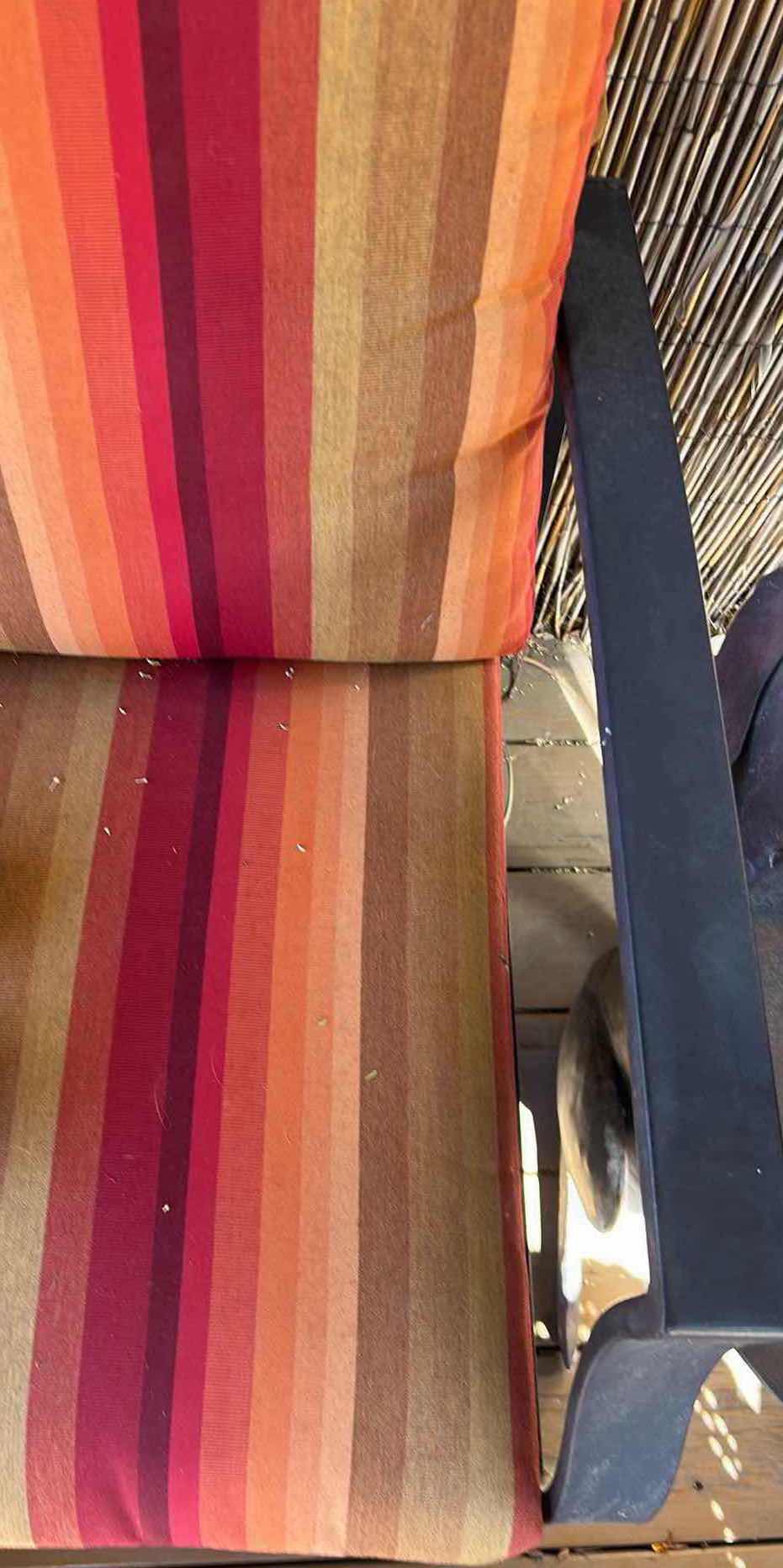 Photo 1 of COASTAL METAL FRAME LOVESEAT W ORANGE STRIPED CUSHIONS 48" X 25