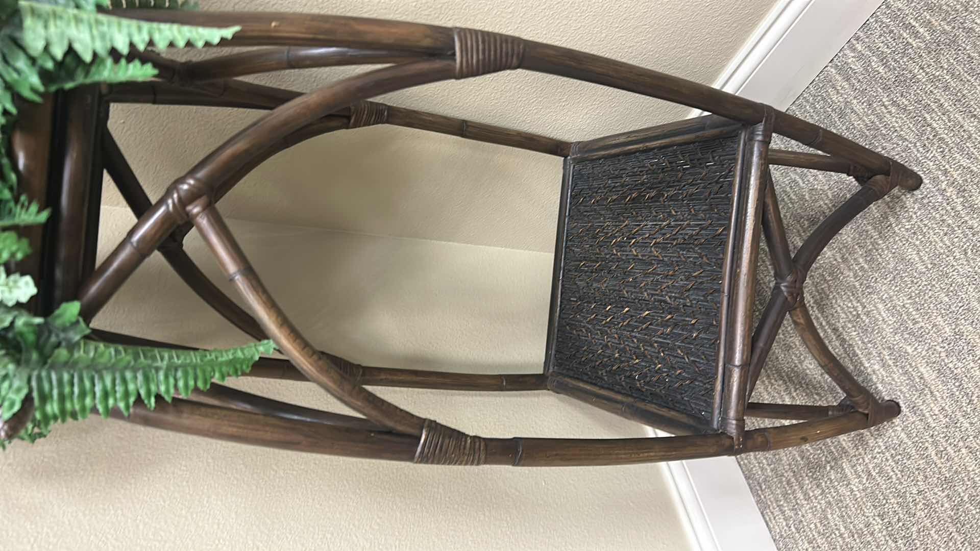 Photo 1 of ARTIFICIAL BOSTON FERN W RATTAN LOWER SHELF AND X SHAPED BASE
H 51"