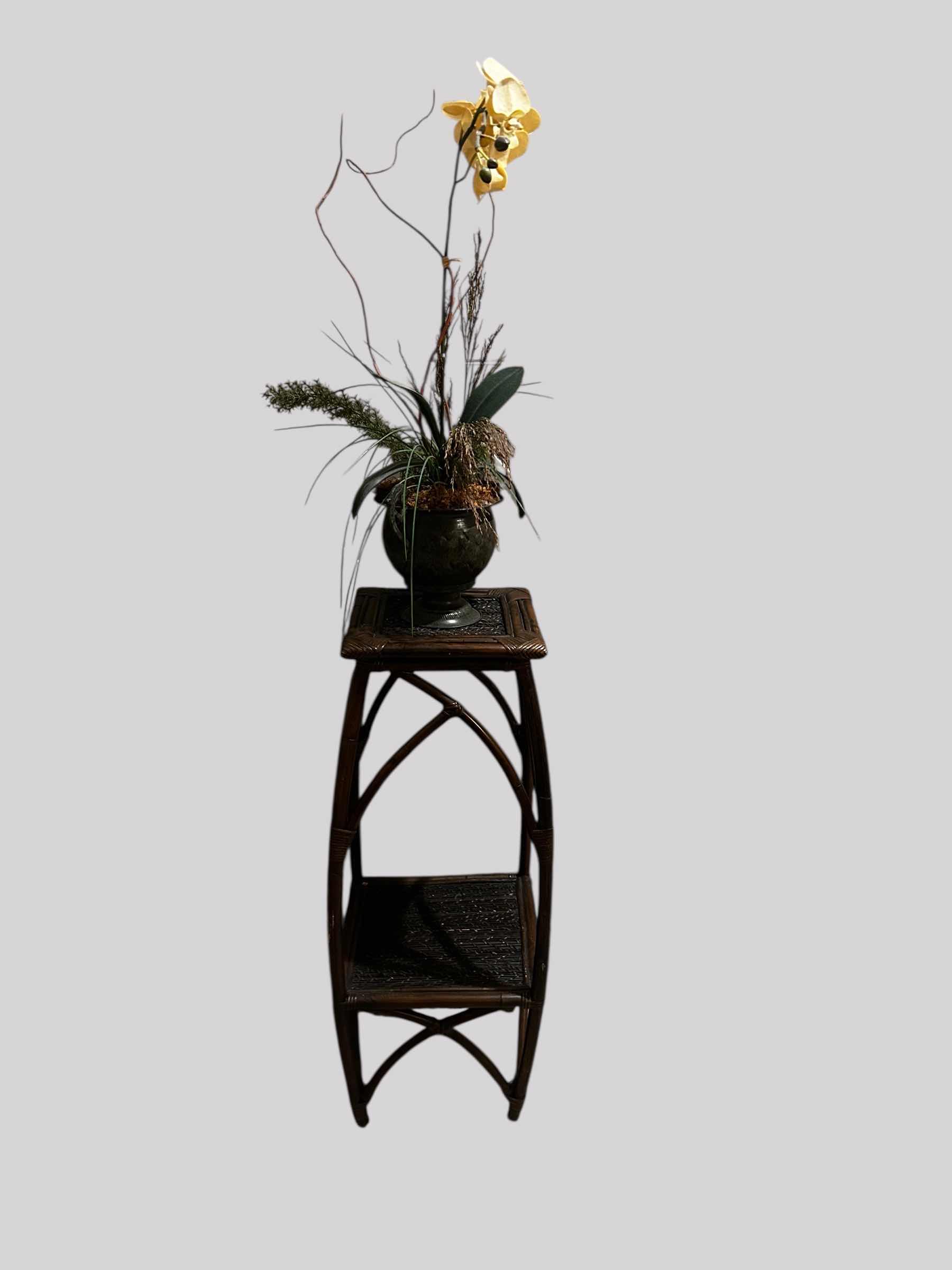Photo 1 of FAUX ORCHID PLANT IN METAL POT W RATTAN LOWER SHELF AND X SHAPED BASE H 51"
