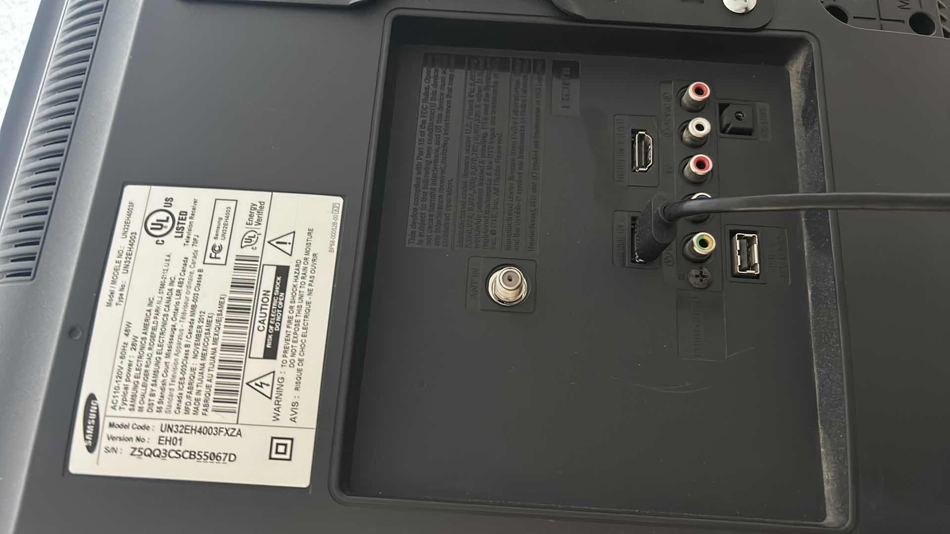 Photo 1 of SAMSUNG 32" WALL MOUNT TV W ROGU AND REMOTE