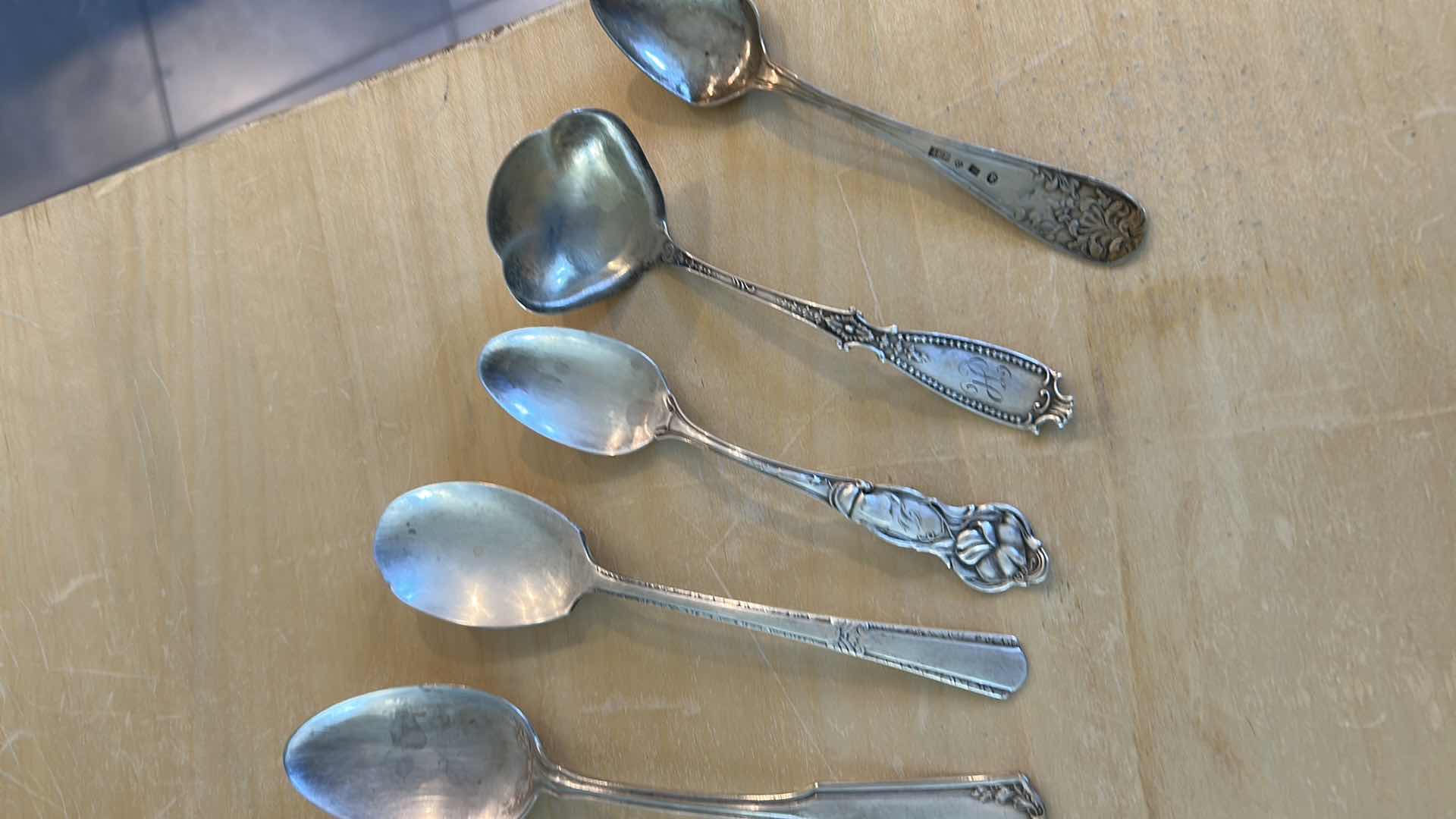 Photo 1 of 12- SILVERPLATED UTENSILS