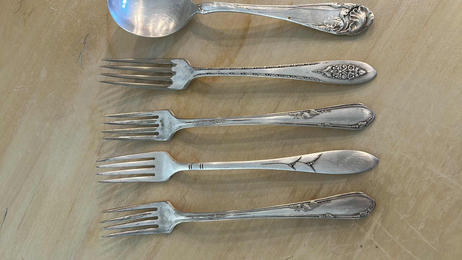 Photo 1 of 12- SILVERPLATED UTENSILS