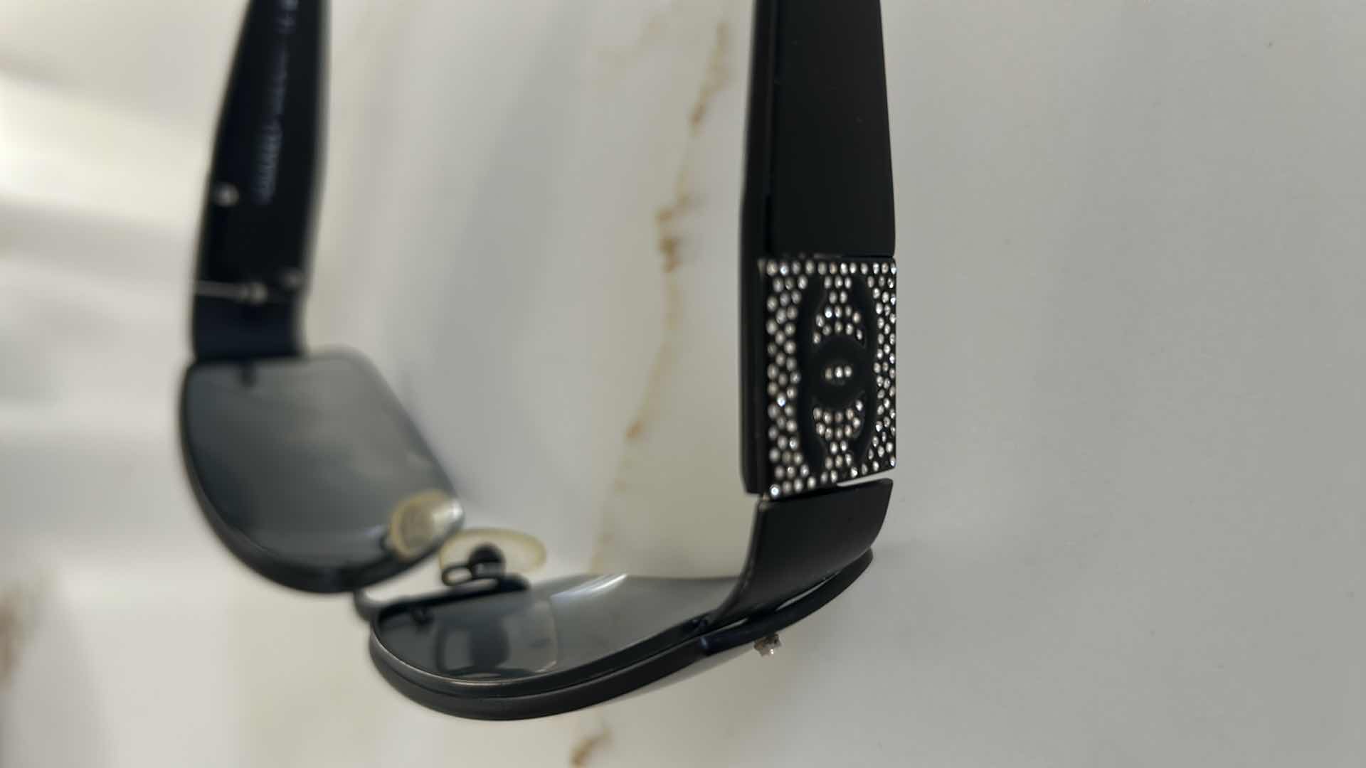 Photo 1 of CHANEL BLACK RIMLESS FRAME W GREY LENSES RHINESTONE CC LOGO ON TEMPLES W CASE