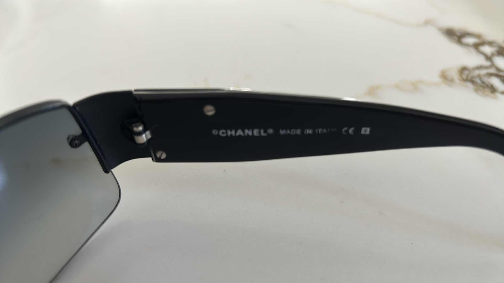 Photo 1 of CHANEL BLACK RIMLESS FRAME W GREY LENSES RHINESTONE CC LOGO ON TEMPLES W CASE