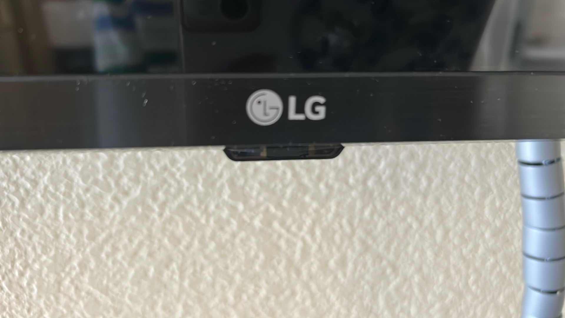 Photo 1 of 42" LG WALL MOUNT TV W REMOTE