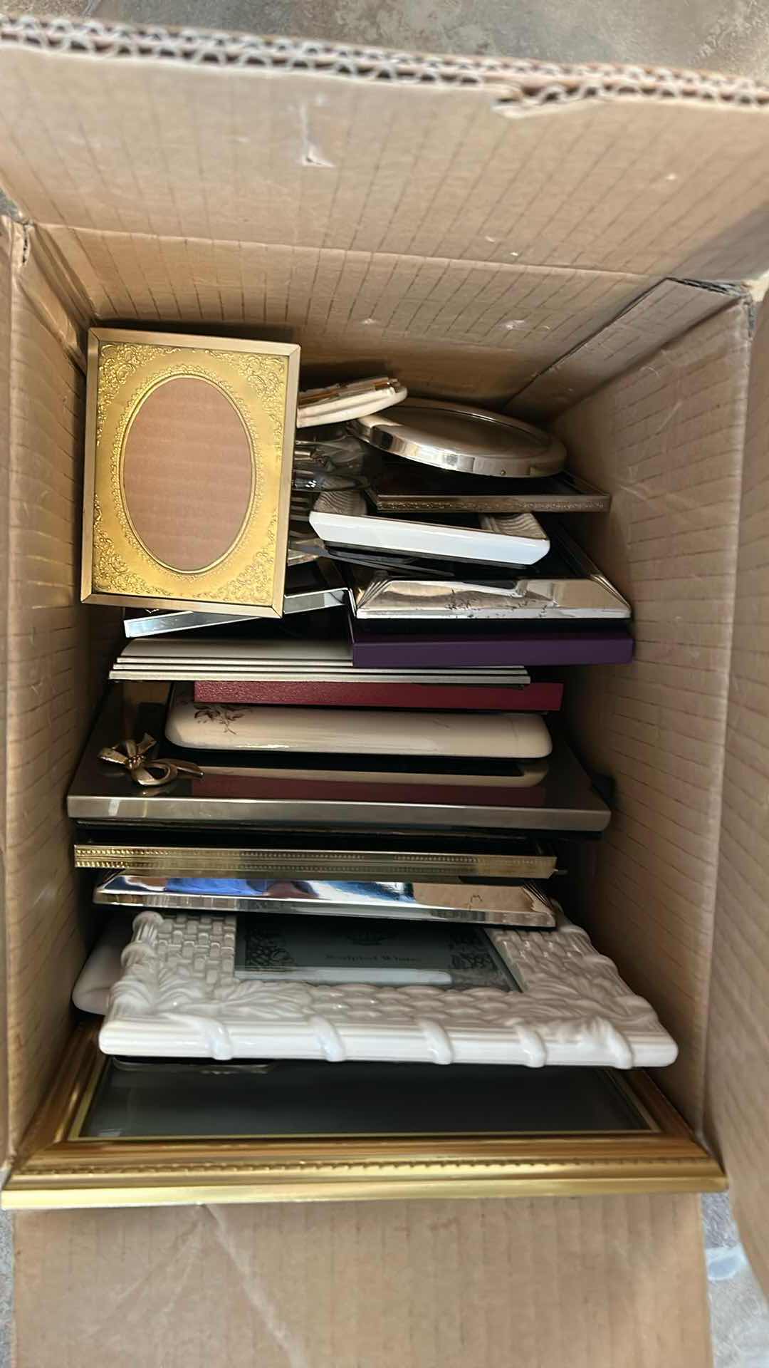 Photo 1 of CONTENTS OF BOX ASSORTED PICTURE FRAMES
