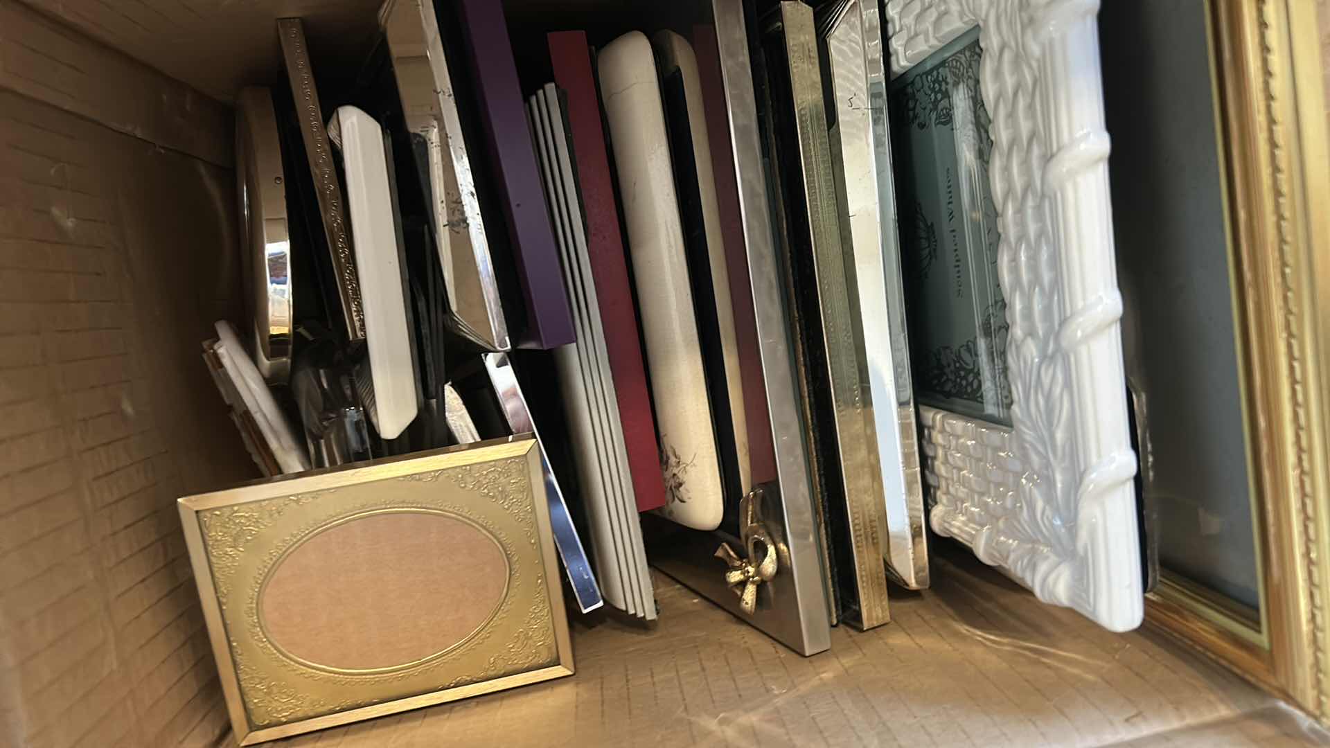 Photo 1 of CONTENTS OF BOX ASSORTED PICTURE FRAMES