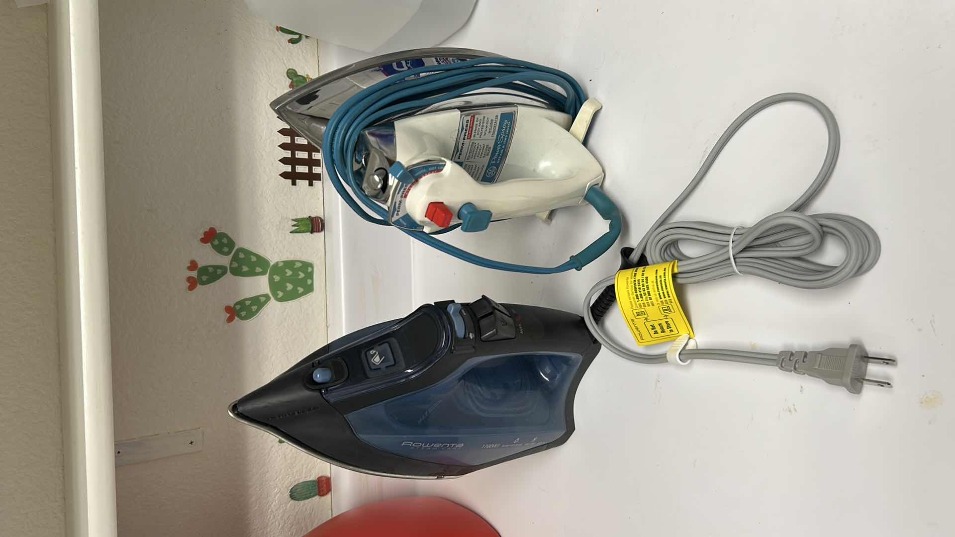 Photo 1 of 2- ROWENTA & GE IRONS