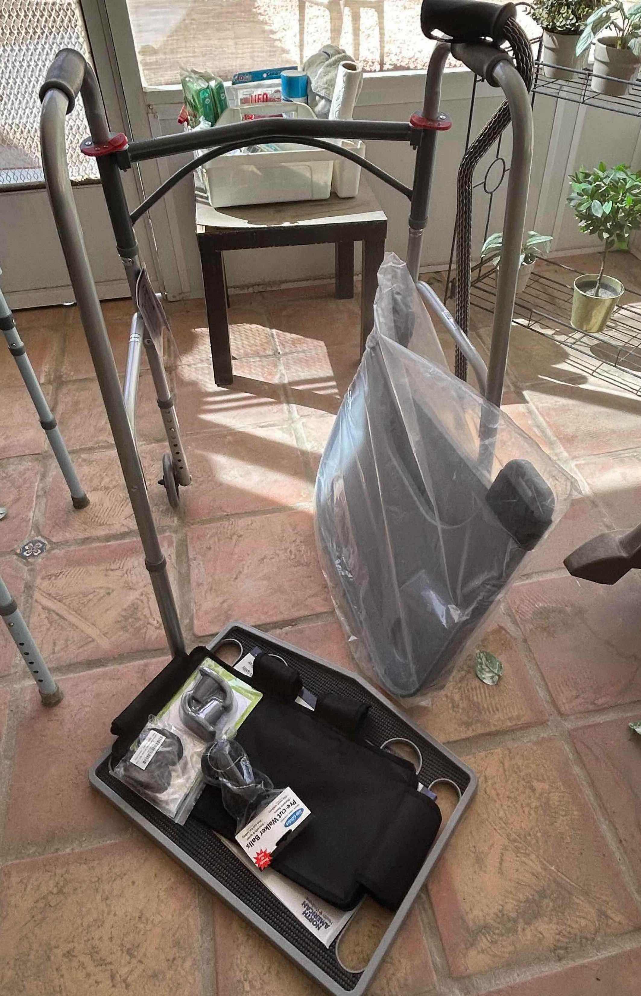 Photo 1 of DRIVE STEEL FOLDING WALKER W ACCESSORIES