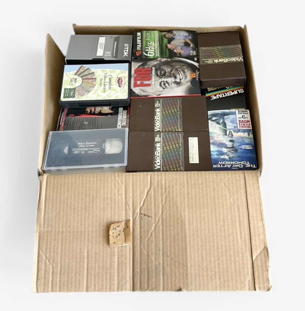 Photo 1 of LARGE HEAVY BOX OF VHS TAPES ( LOTS MORE THAN PHOTOGRAPHED IN BOX)