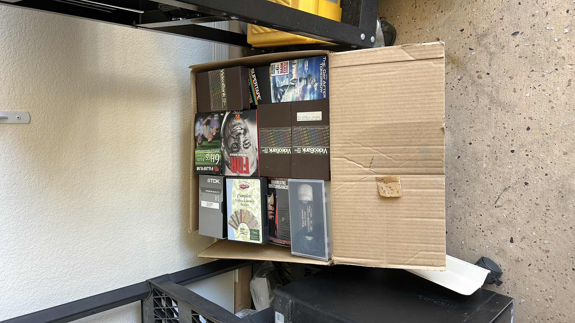 Photo 1 of LARGE HEAVY BOX OF VHS TAPES ( LOTS MORE THAN PHOTOGRAPHED IN BOX)