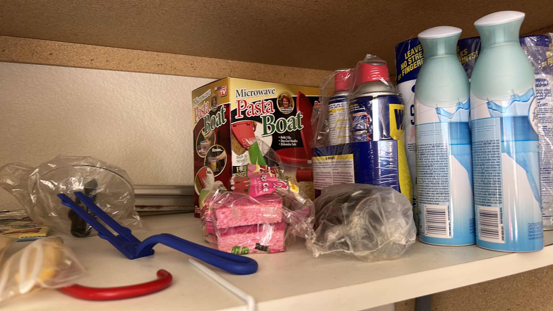 Photo 1 of CONTENTS IN CABINET, ORECK VACUUM, FLOOR CLEANER AND MORE