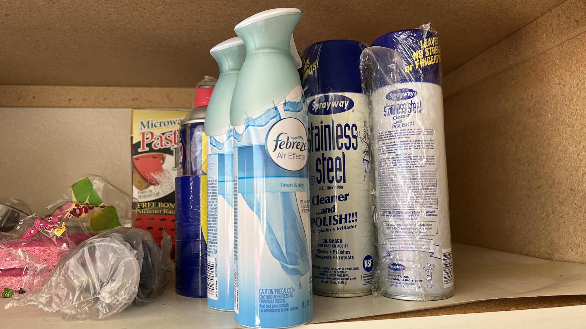 Photo 1 of CONTENTS IN CABINET, ORECK VACUUM, FLOOR CLEANER AND MORE
