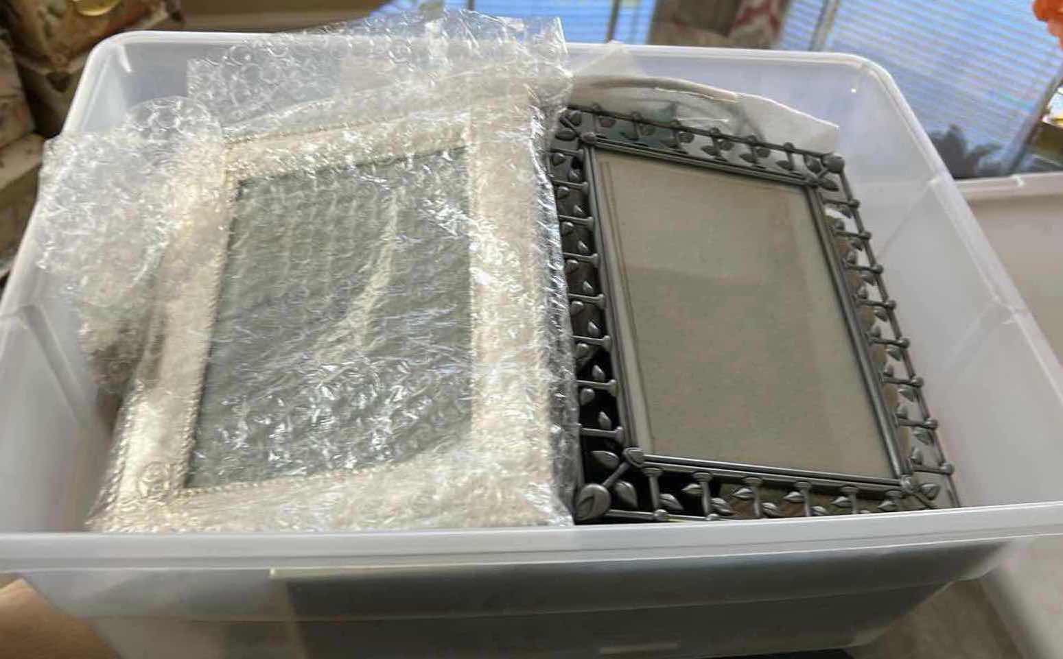 Photo 1 of CONTENTS OF PLASTIC CONTAINER ASSORTED PICTURE FRAMES