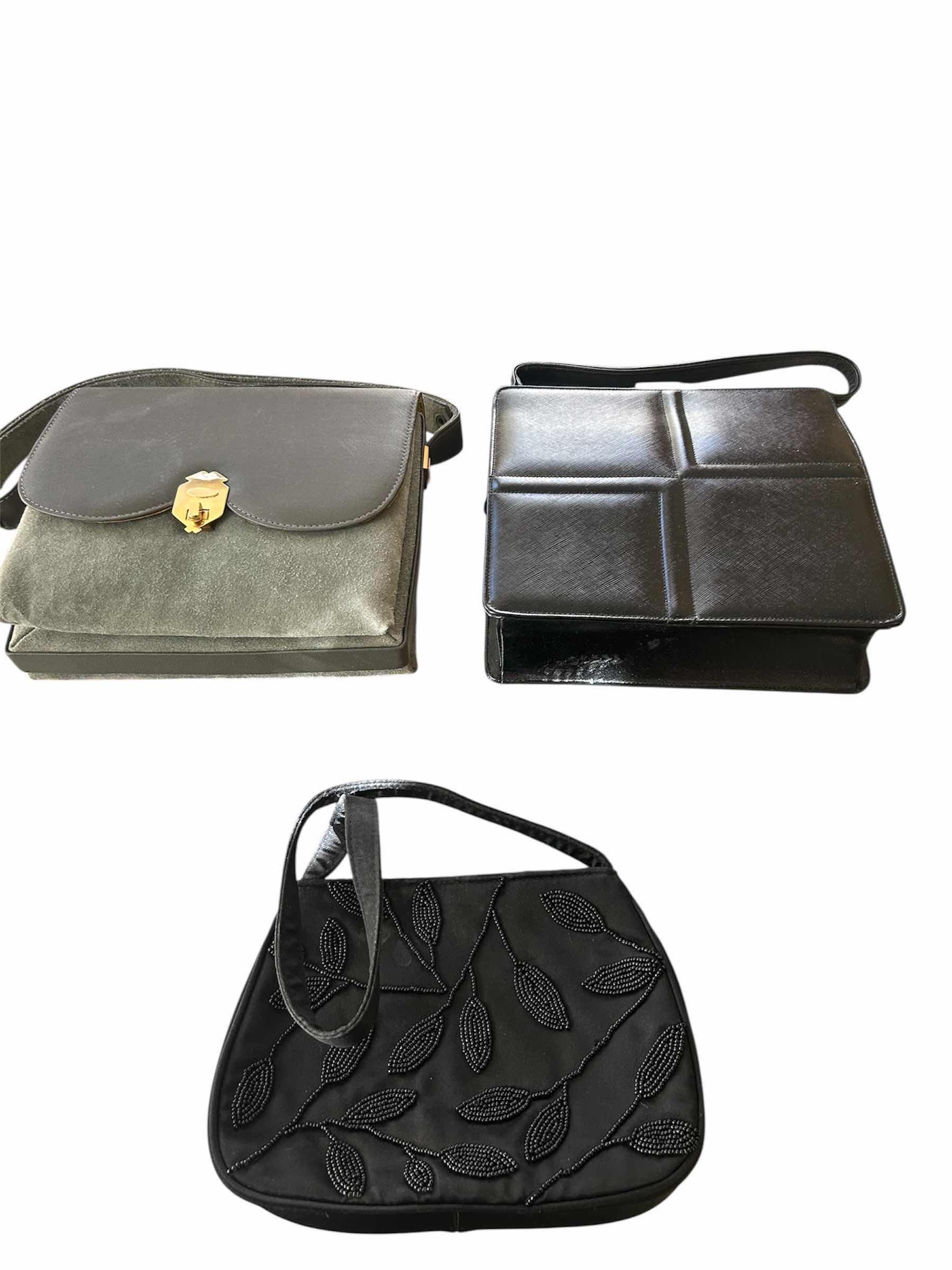 Photo 1 of 3- WOMANS HAND BAG