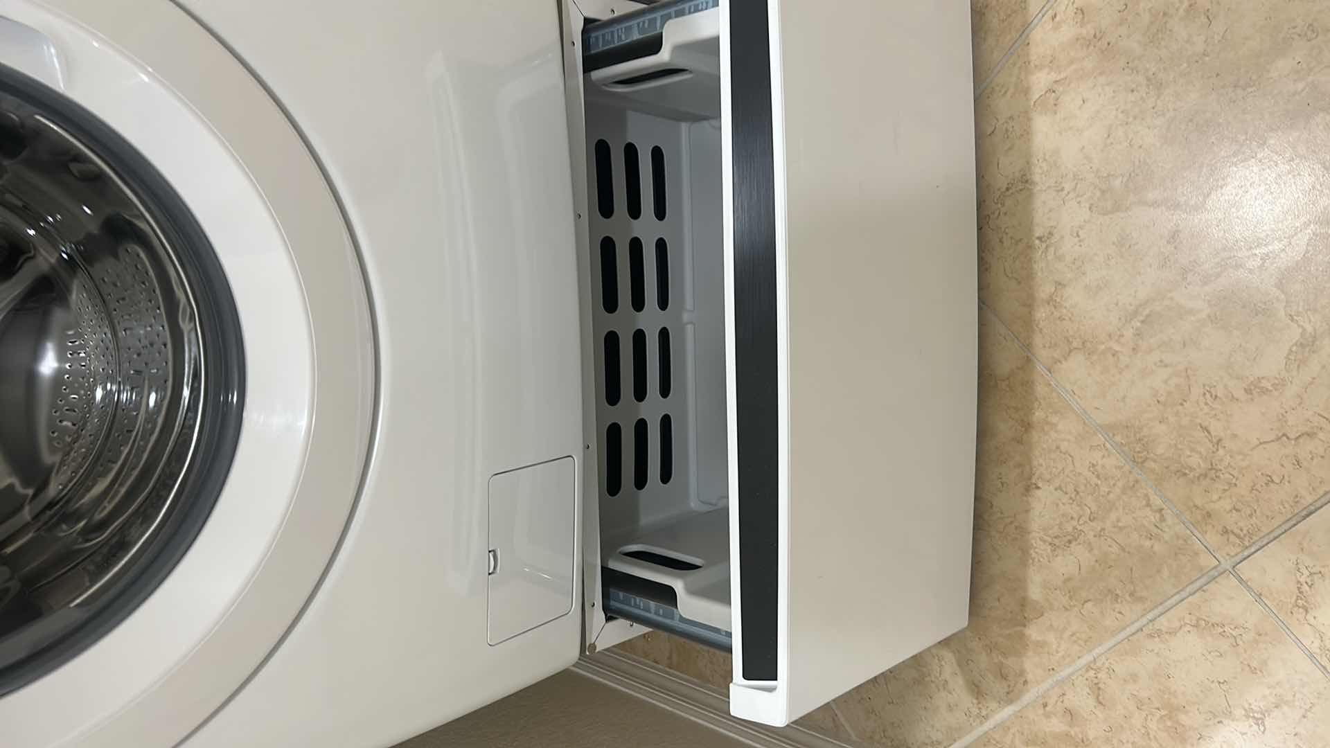 Photo 1 of LG 5.5 CU FT WHITE FRONT LOAD WASHER MODEL WM3400CW W PEDESTAL H 53" W 27"