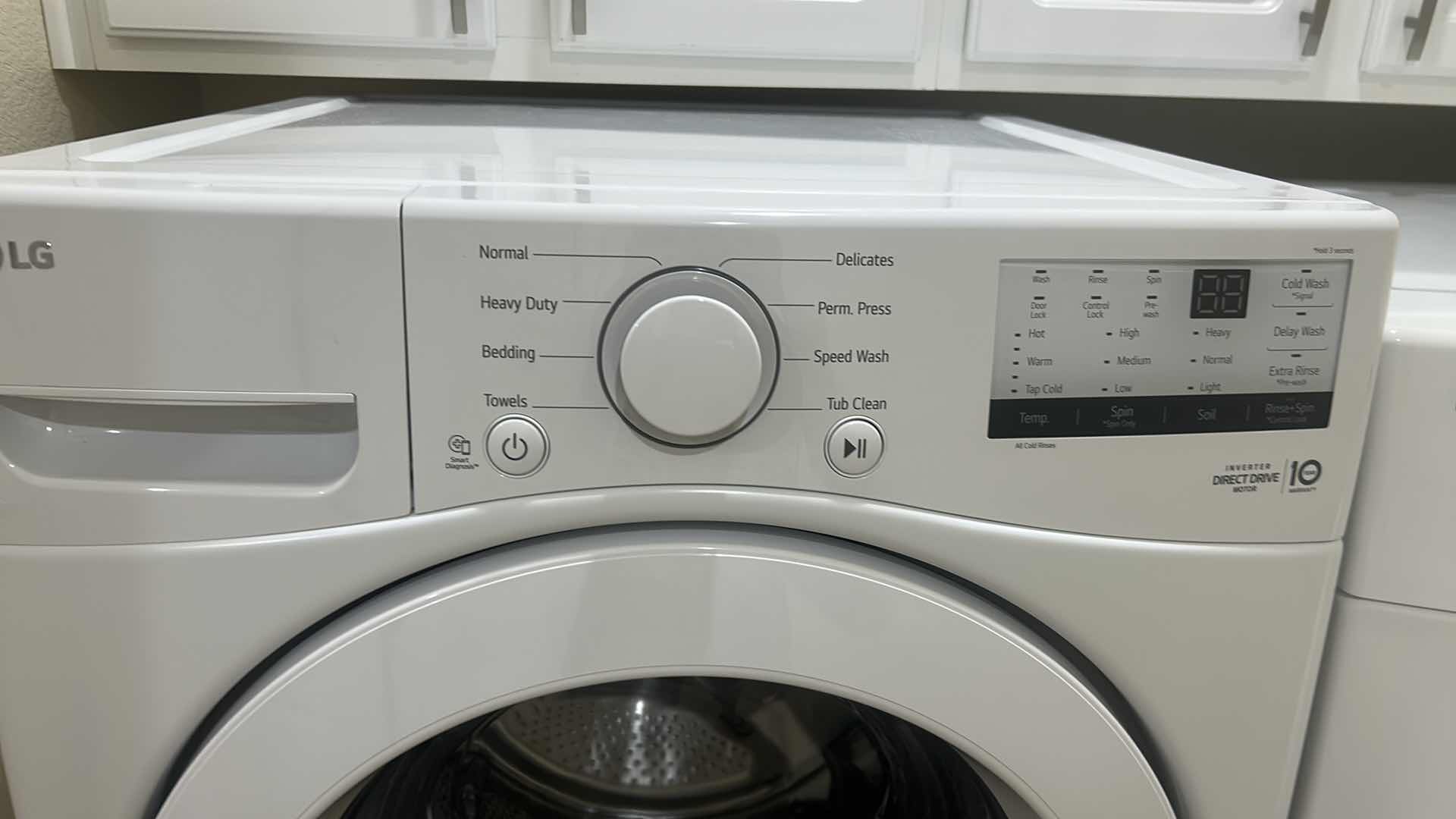 Photo 1 of LG 5.5 CU FT WHITE FRONT LOAD WASHER MODEL WM3400CW W PEDESTAL H 53" W 27"