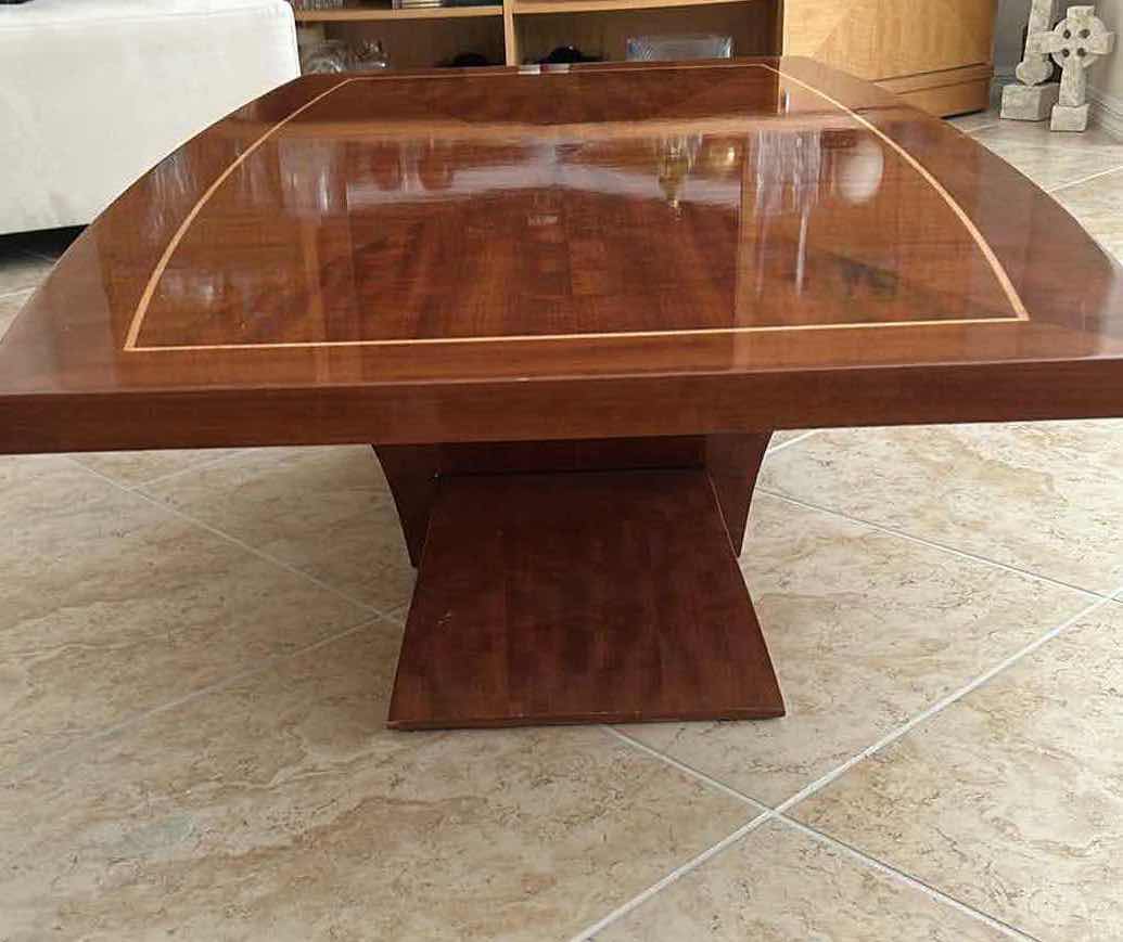 Photo 1 of STARBURST MAHOGANY VENEER W CONTRASTING INLAY BORDER COFFEE TABLE W CURVED ARCH BASE 54" X 31" H 17"