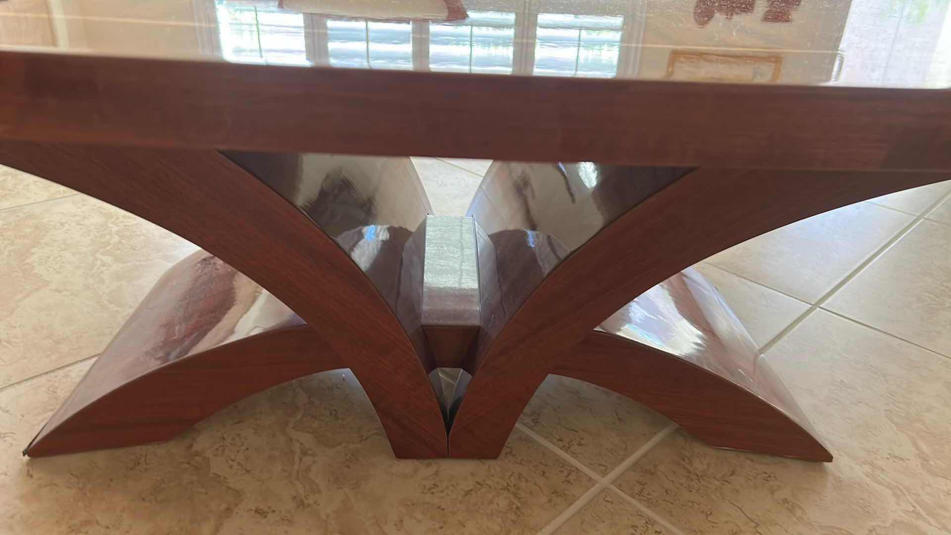 Photo 1 of STARBURST MAHOGANY VENEER W CONTRASTING INLAY BORDER COFFEE TABLE W CURVED ARCH BASE 54" X 31" H 17"