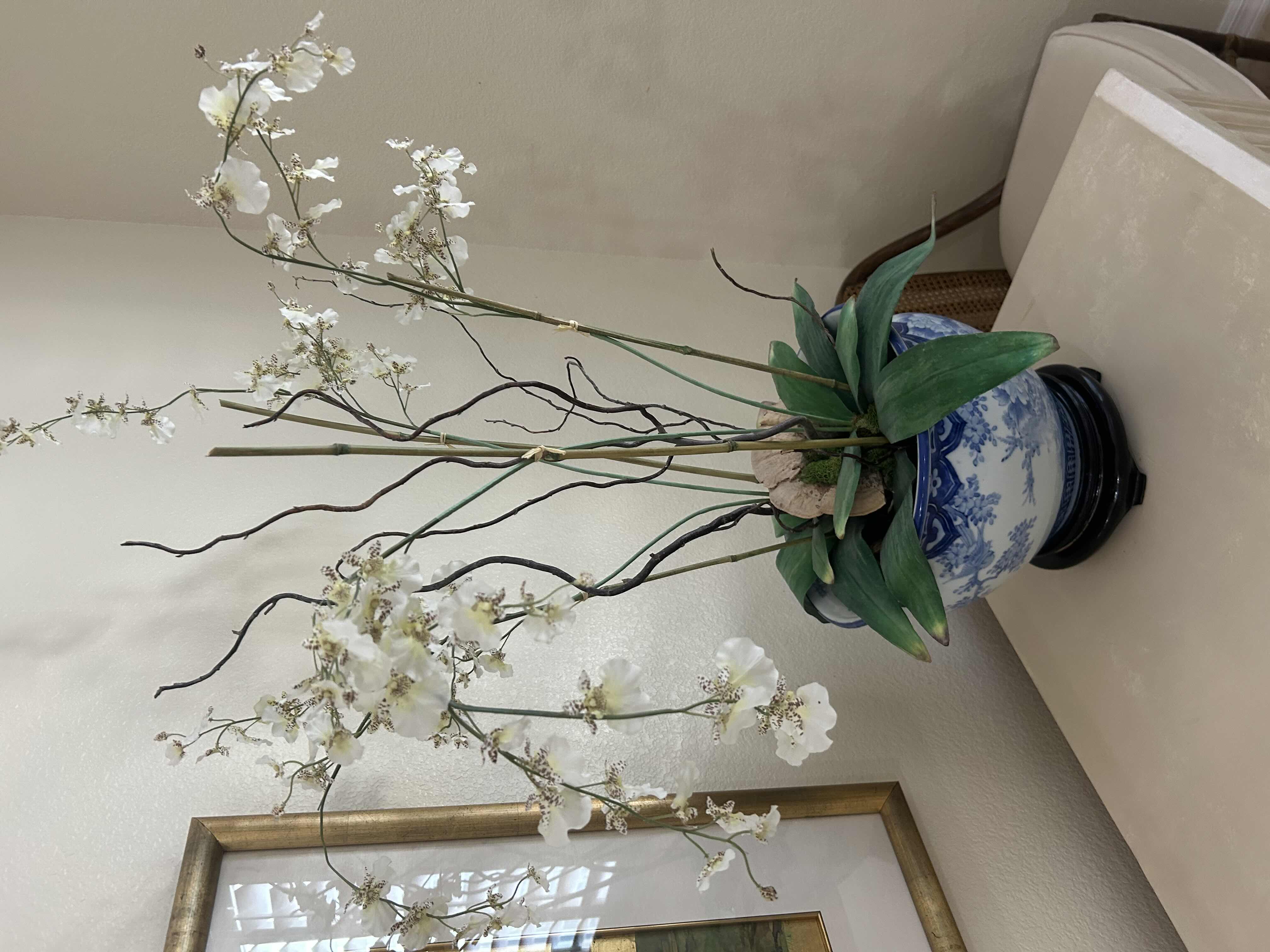 Photo 1 of ARTIFICIAL PHALAENOPSIS ORCHID STYLED IN A BLUE AND WHITE CERAMIC PLANTER H