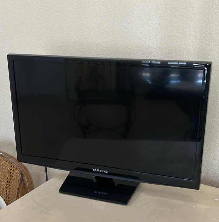 Photo 1 of 24" SAMSUNG TV ON PEDESTAL W REMOTE