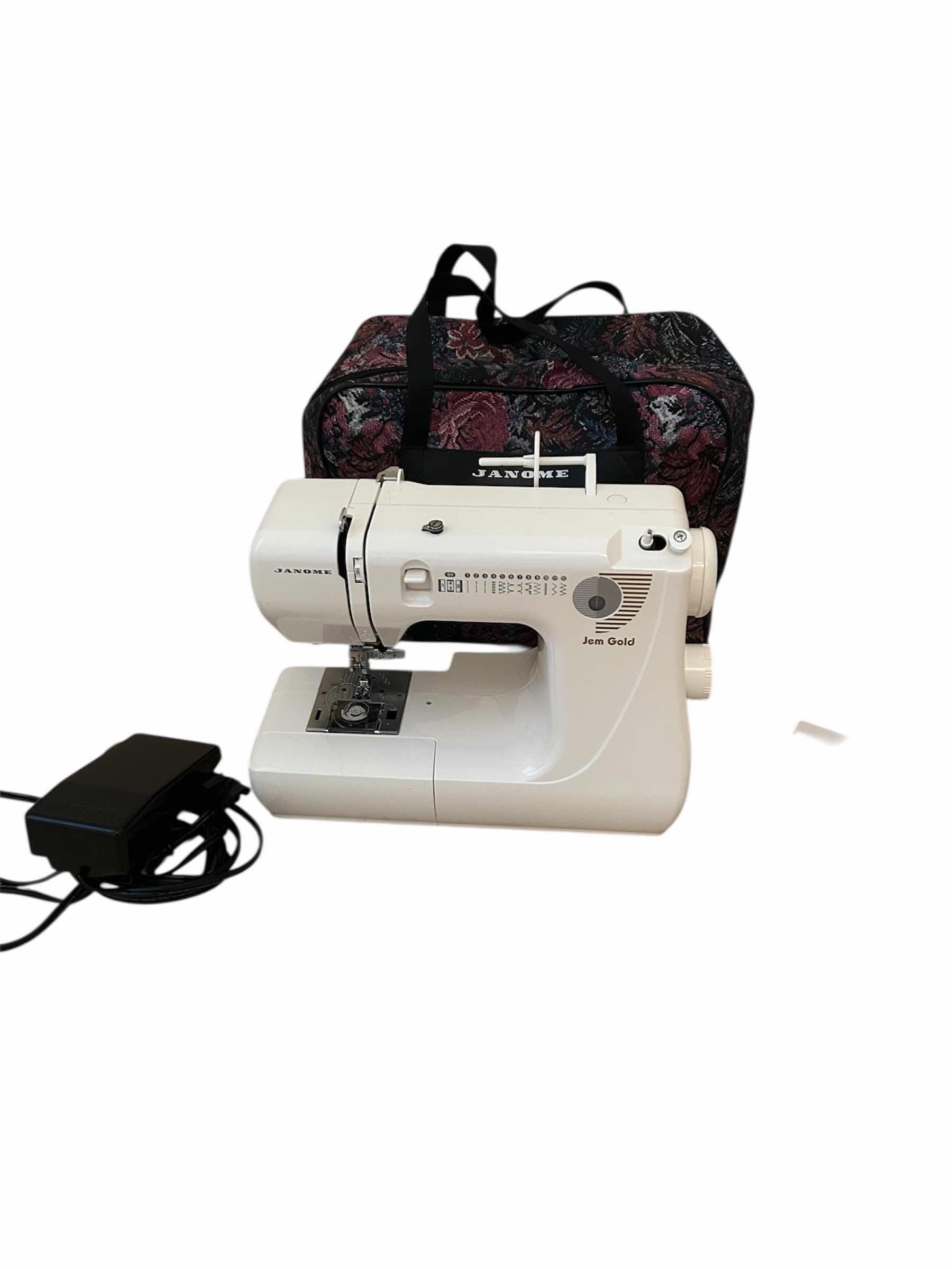 Photo 1 of JANOME JEM GOLD 660 SEWING MACHINE W CARRYING BAG