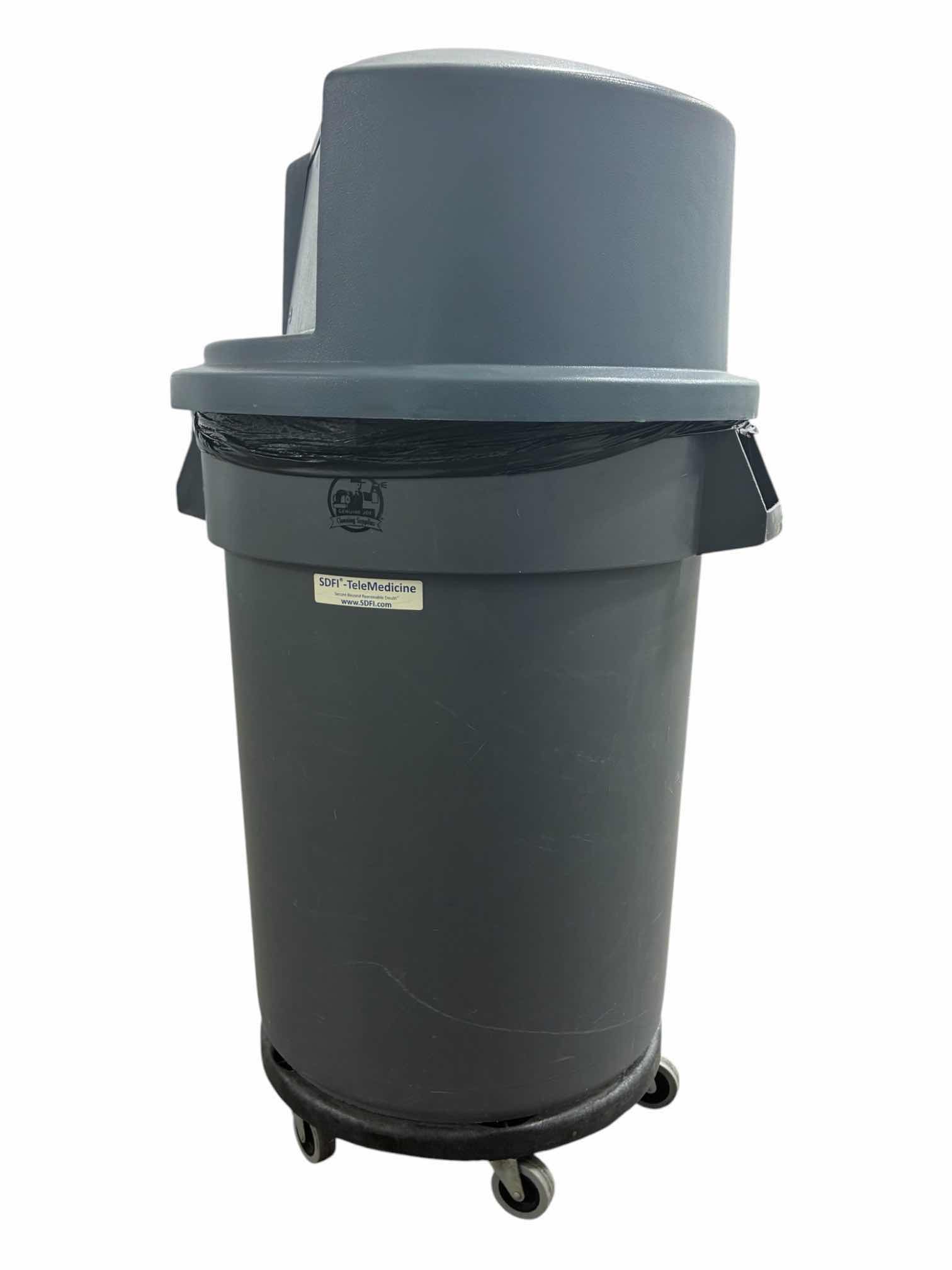Photo 1 of RUBBERMAID 32GAL GRAY ROLLING GARBAGE BIN W LID