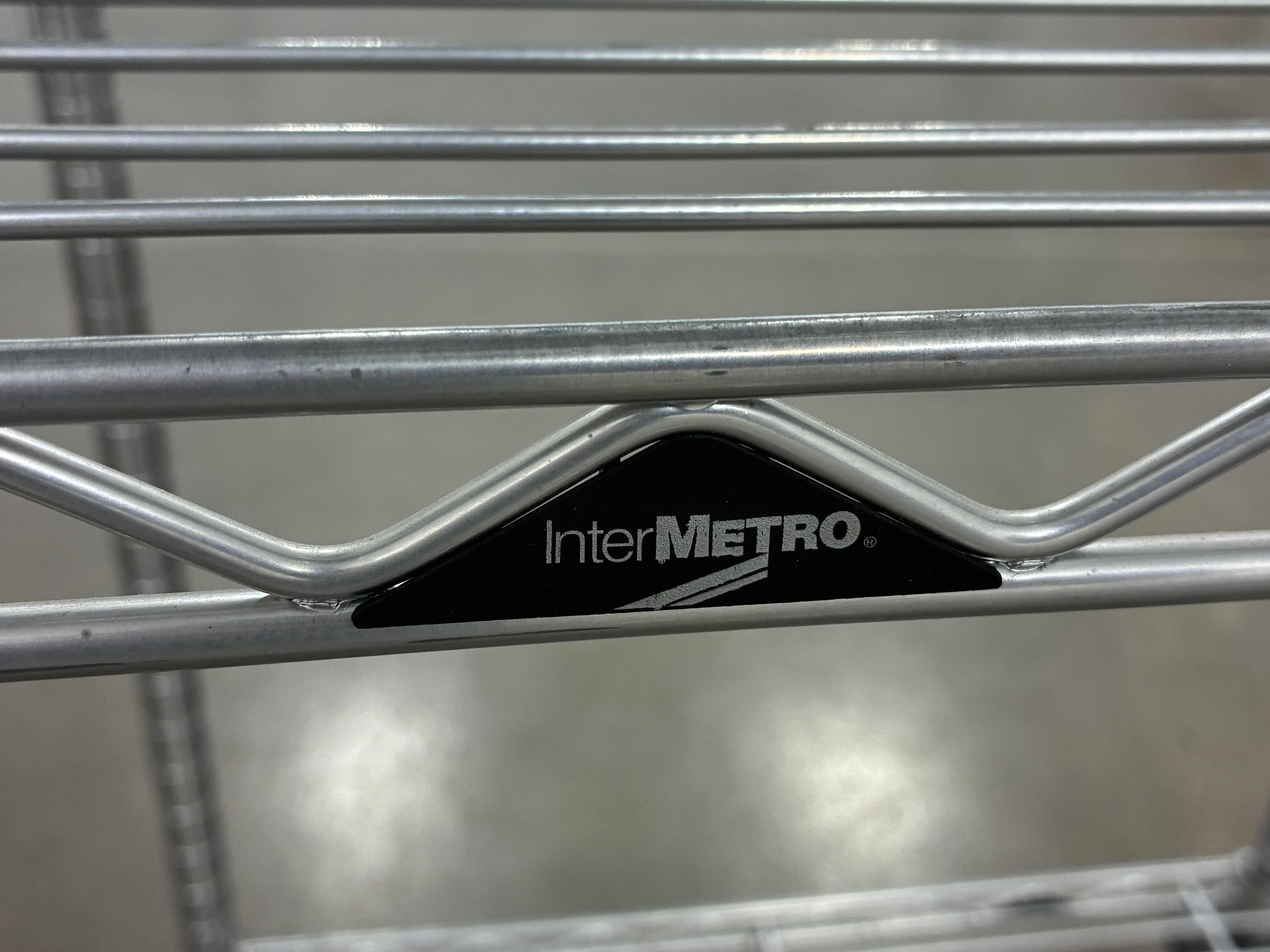 Photo 1 of INTER-METRO 2 TIER ROLLING RACK CART 24“ X 18“ H39“
