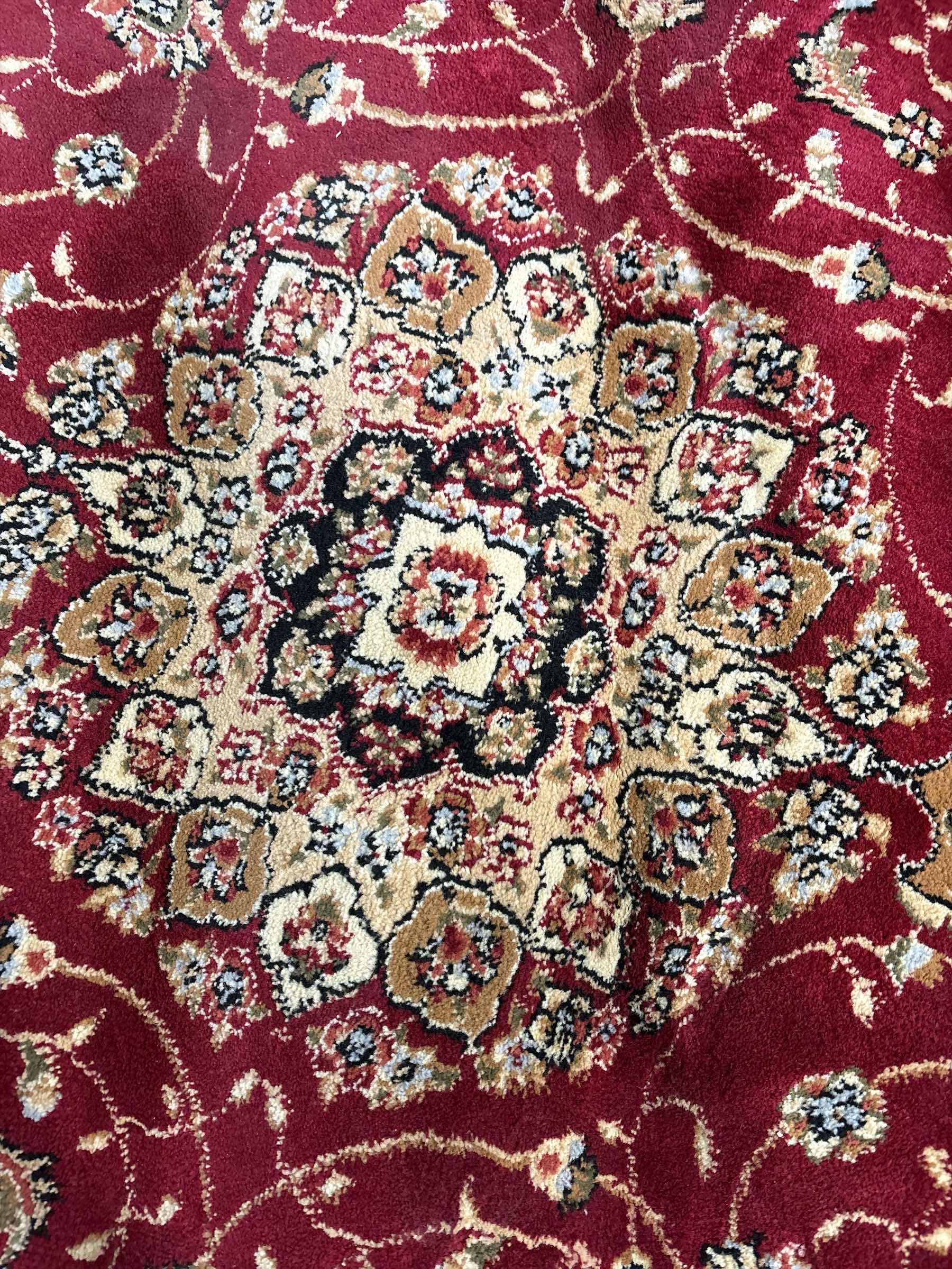 Photo 1 of CIRCULAR HAND TUFTED WOOL RUG 44” RETAIL $189