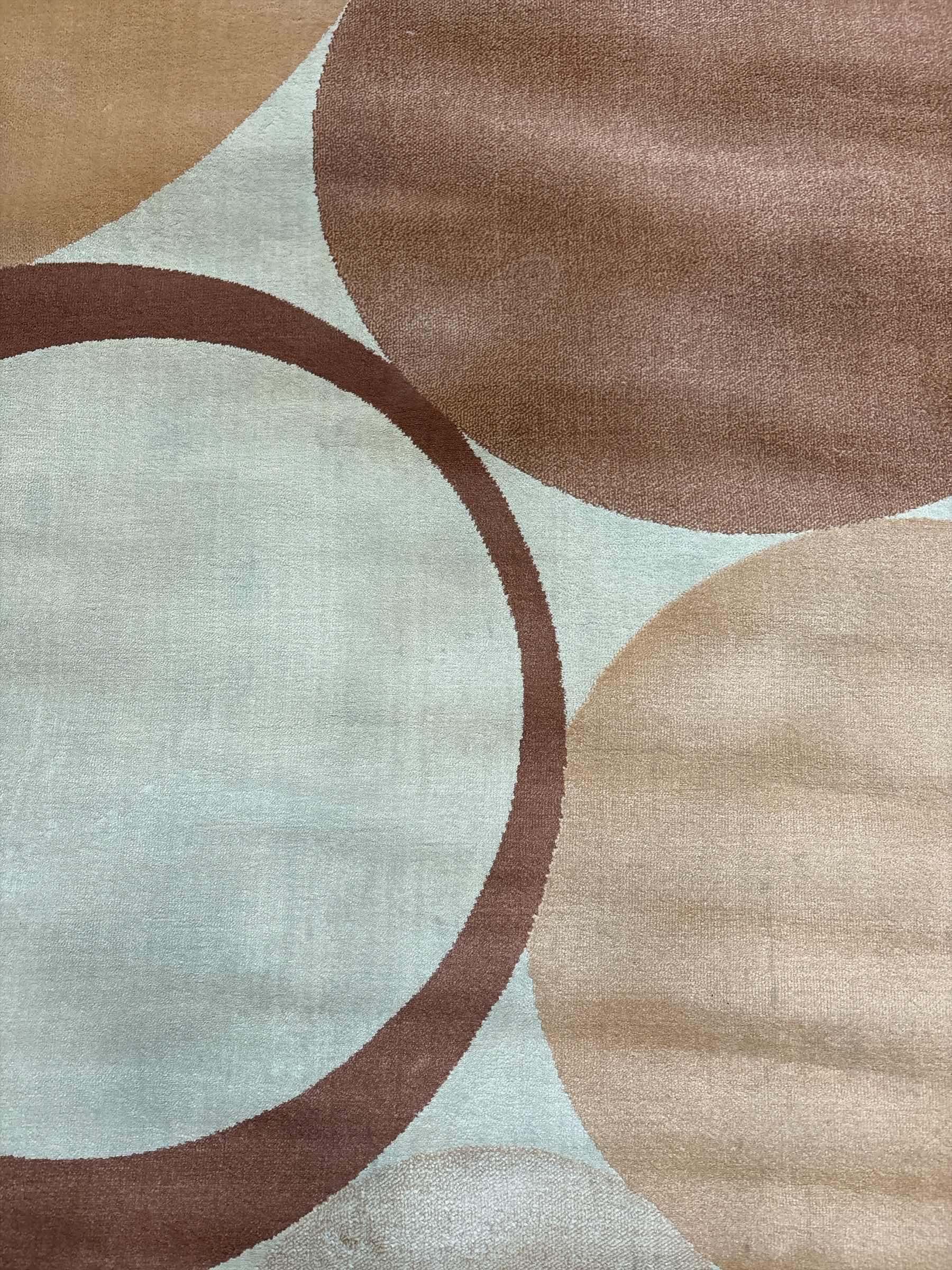 Photo 1 of GOLD CIRCLES RUG 89.5”X62”