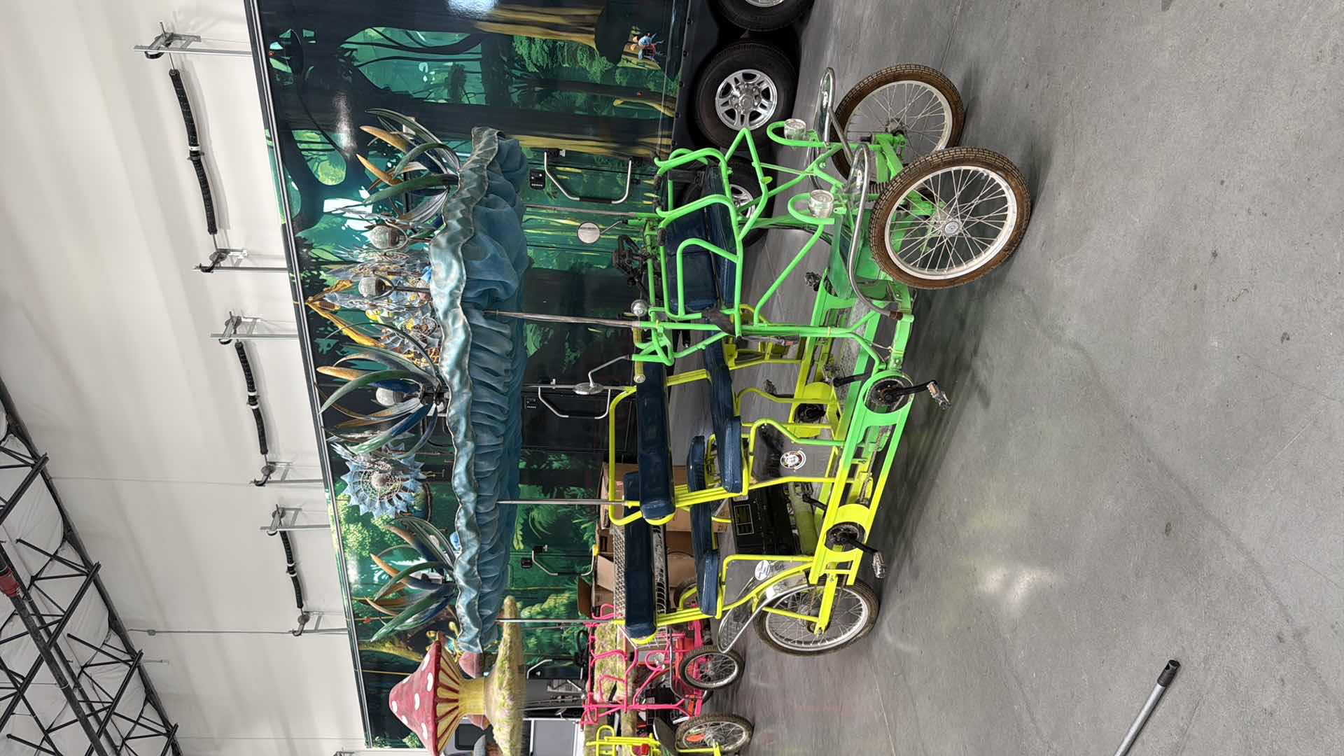 Photo 1 of CUSTOM WHIMSICAL SURREY LIMOUSINE DELUXE 7 SPEED 4 WHEEL 4 PEDALERS DUAL SIDES PEDAL W 3RD WHEEL BATTERY POWERED BIKE-BRIGHT GREEN/YELLOW W BLUE WINDMILL SPIN TOPS-BY THE SURREY COMPANY