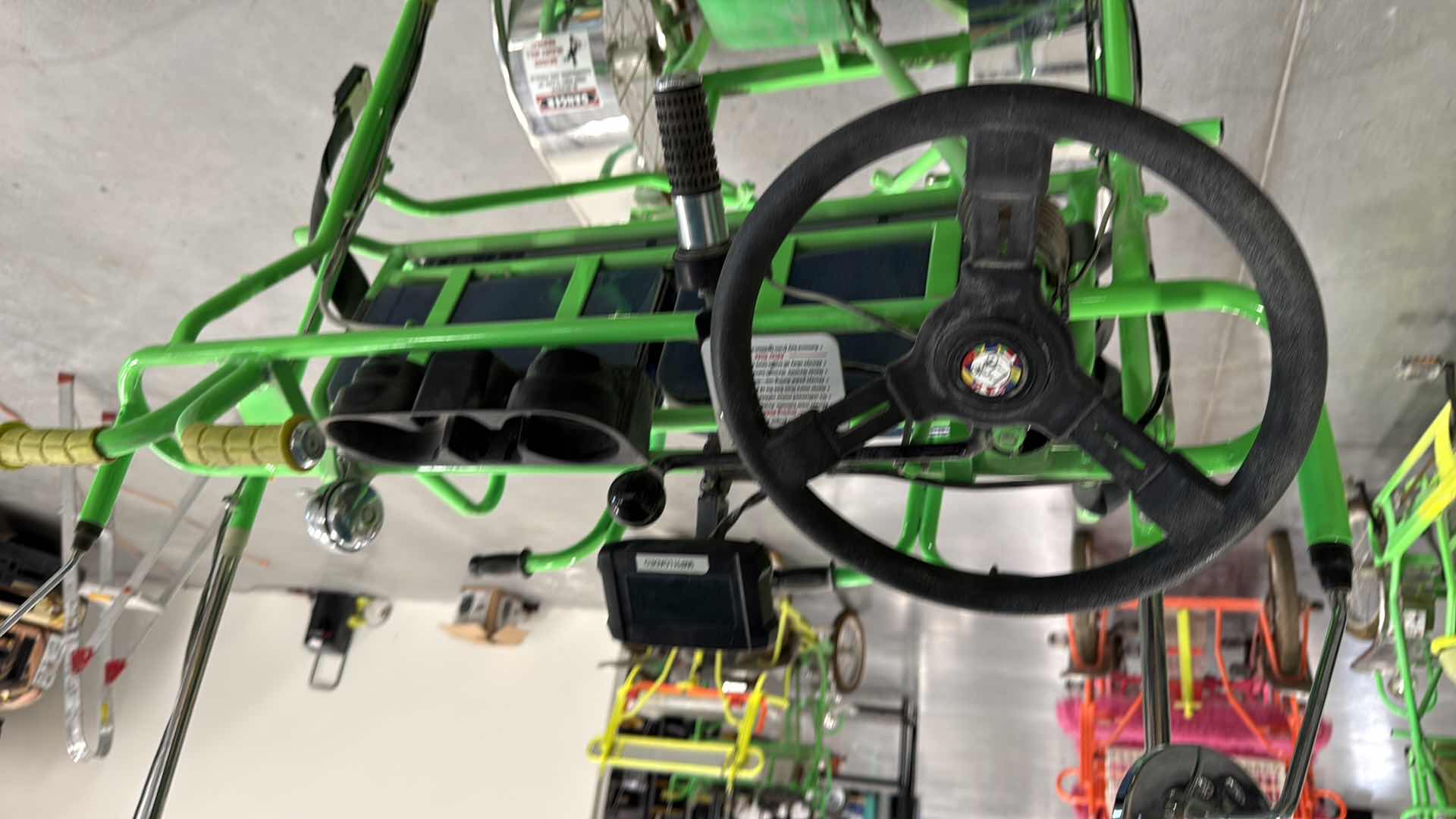 Photo 1 of CUSTOM WHIMSICAL SURREY LIMOUSINE DELUXE 7 SPEED 4 WHEEL 4 PEDALERS DUAL SIDES PEDAL W 3RD WHEEL BATTERY POWERED BIKE-BRIGHT GREEN/YELLOW W BLUE WINDMILL SPIN TOPS-BY THE SURREY COMPANY