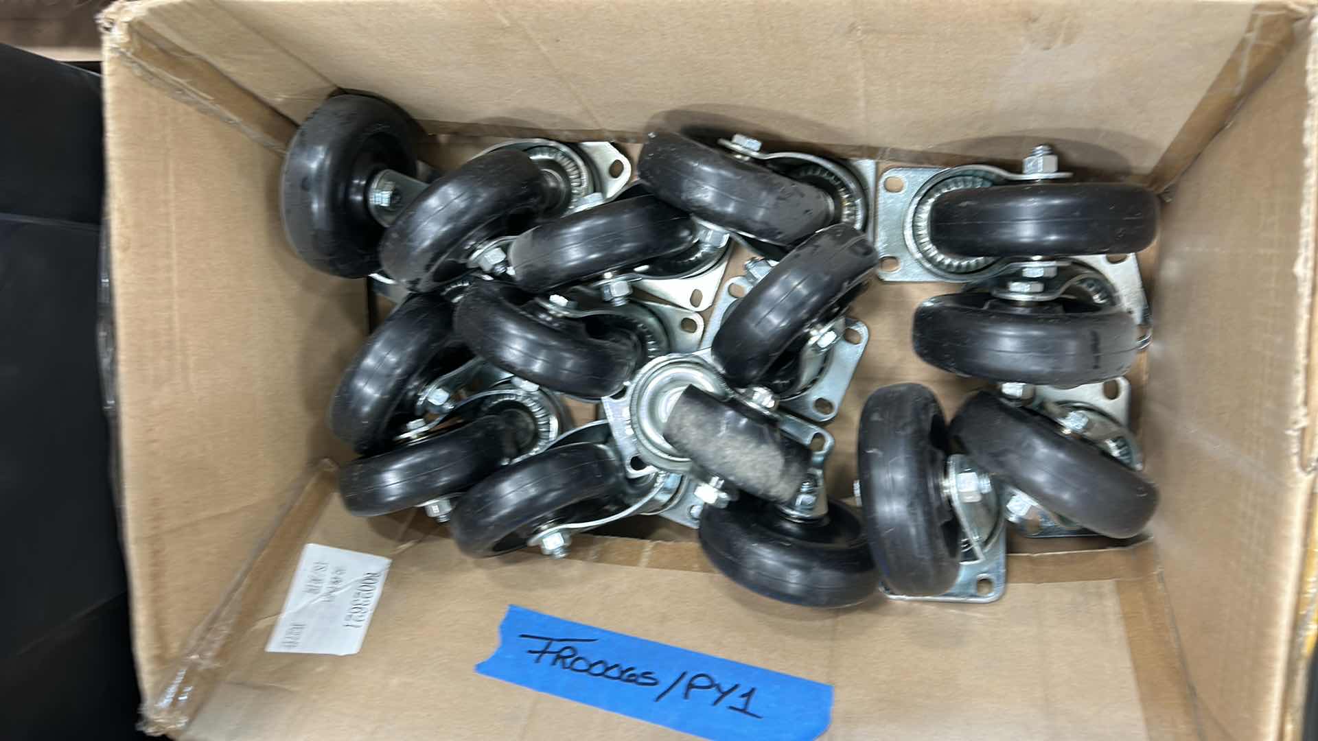 Photo 1 of BOX FULL OF CASTERS