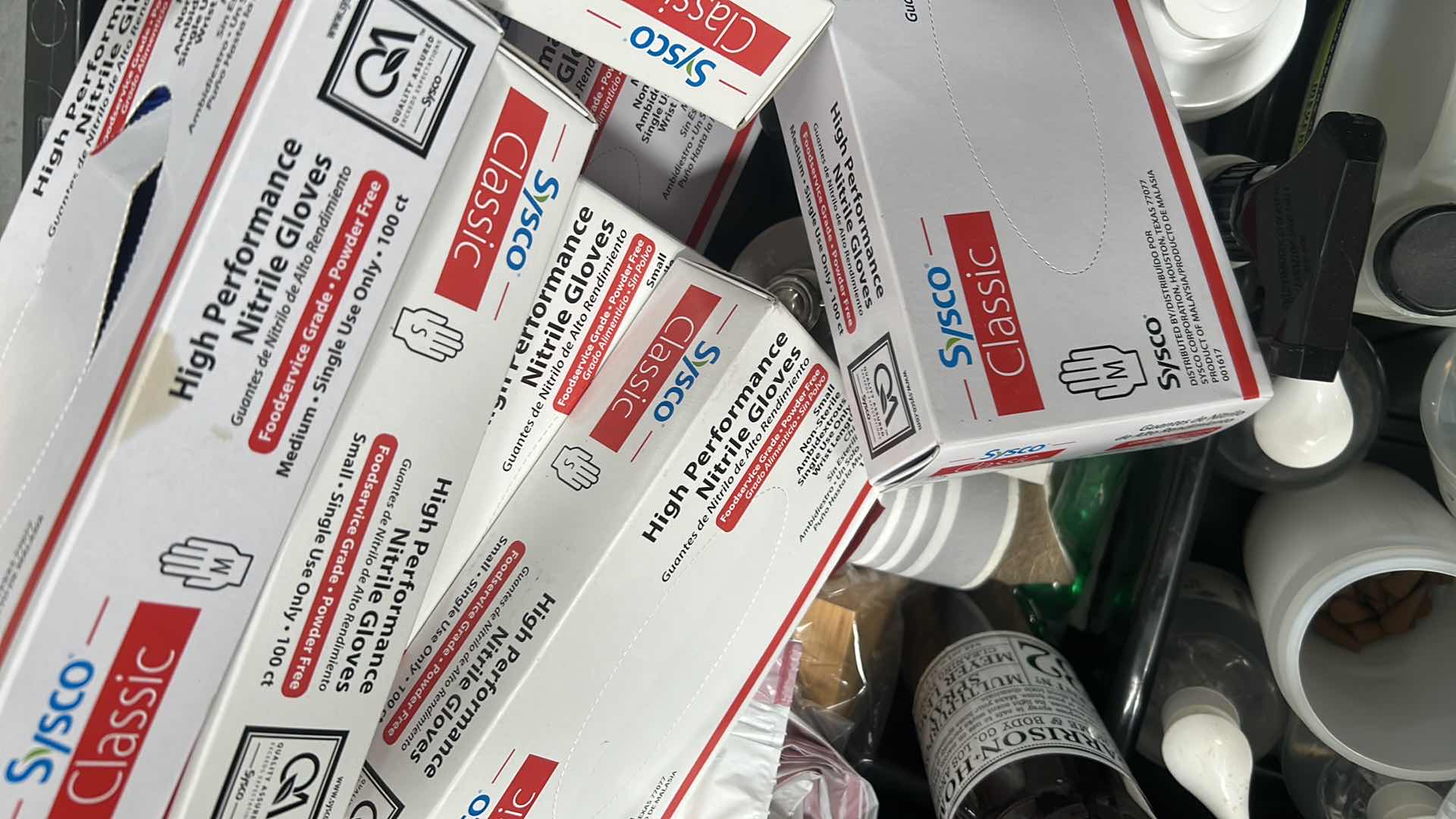 Photo 1 of CONTENTS OF CONTAINER NITRILE GLOVES AND ASSORTED SANITIZER DISPENSER