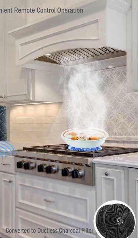 Photo 1 of MCBON IE71-30 STAINLESS STEEL RANGE HOOD Dimensions: Approximately 27.75" W x 11.75" D x 10.8" H.