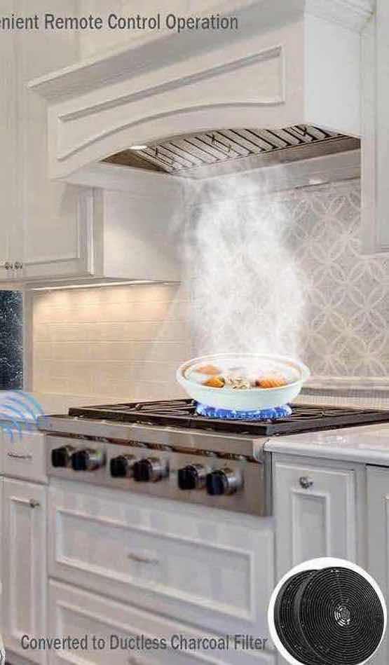 Photo 1 of MCBON IE71-30 STAINLESS STEEL RANGE HOOD Dimensions: Approximately 27.75" W x 11.75" D x 10.8" H.