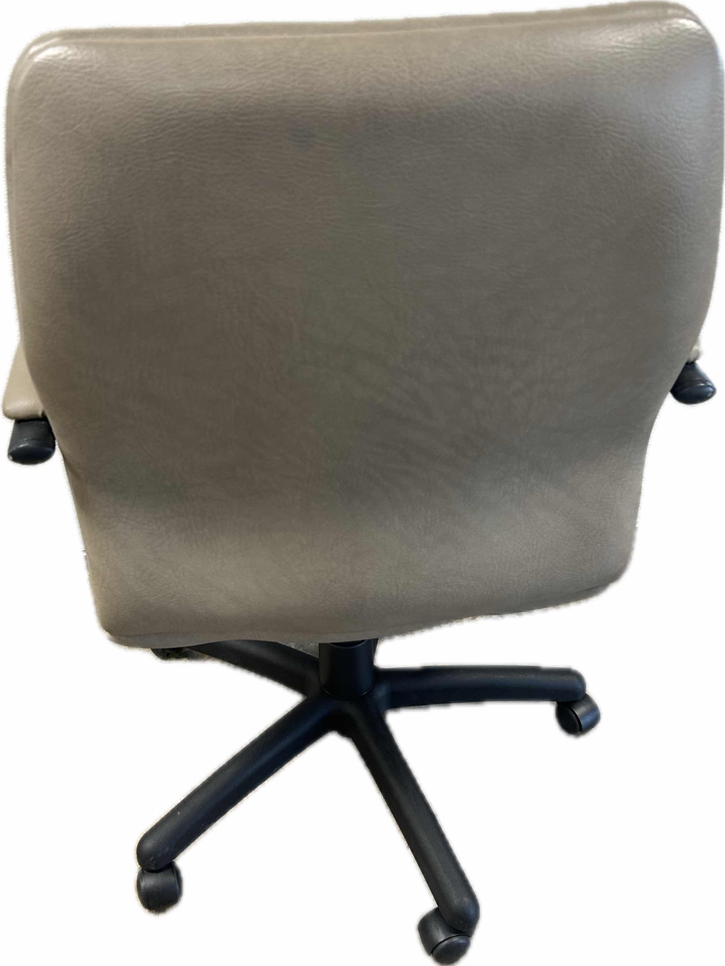 Photo 1 of  BEIGE SWIVEL LEATHER OFFICE CHAIR ON CASTERS