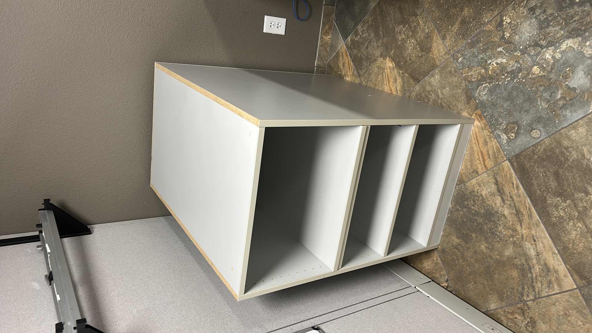 Photo 1 of BEIGE HEAVY LAMINATED 4 SHELVING UNIT  21.5 x 34.5 x H36”