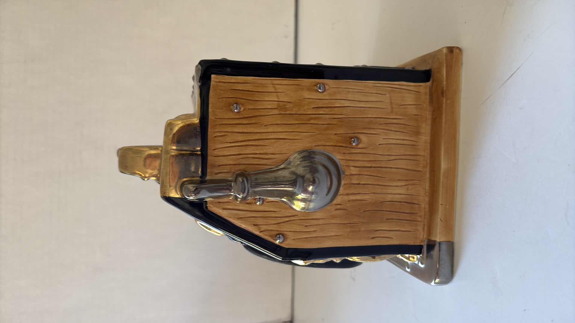 Photo 1 of J BAILEY 1995  THE GOLDEN SALOON MILLS 3 REEL SLOT MACHINE COIN BANK