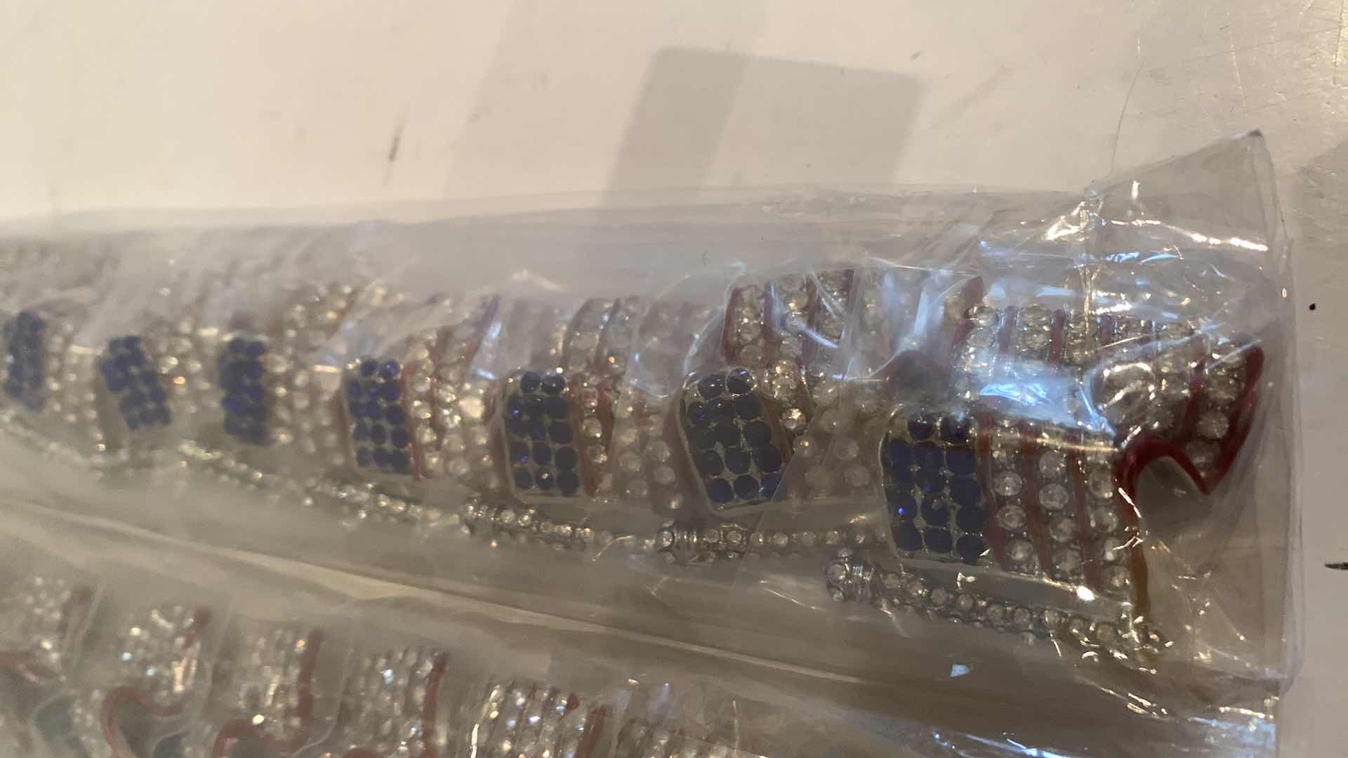 Photo 1 of 3 BAGS OF UNITED STATES FLAG PINS