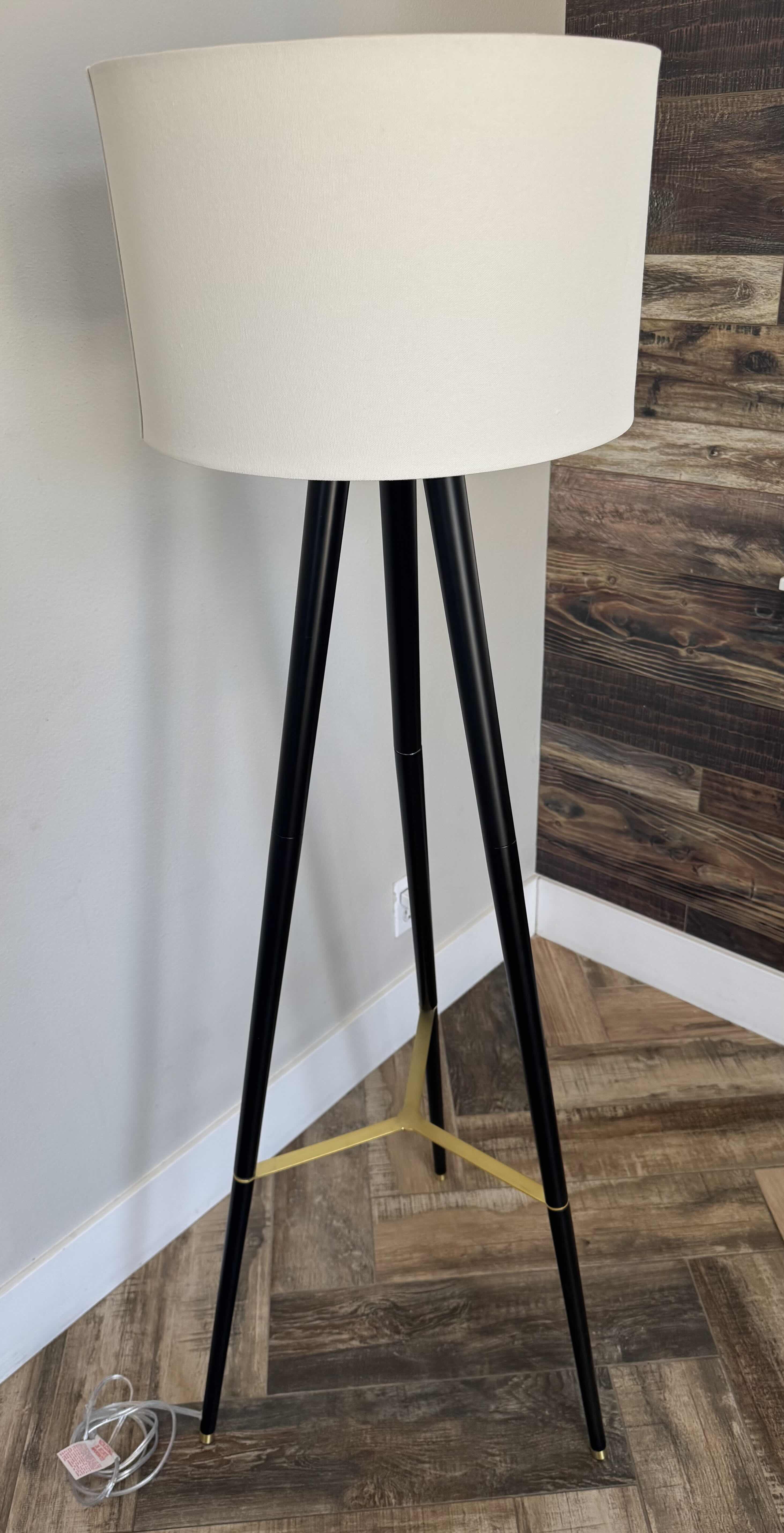 Photo 1 of BLACK METAL TRIPOD FLOOR LAMP H60"
